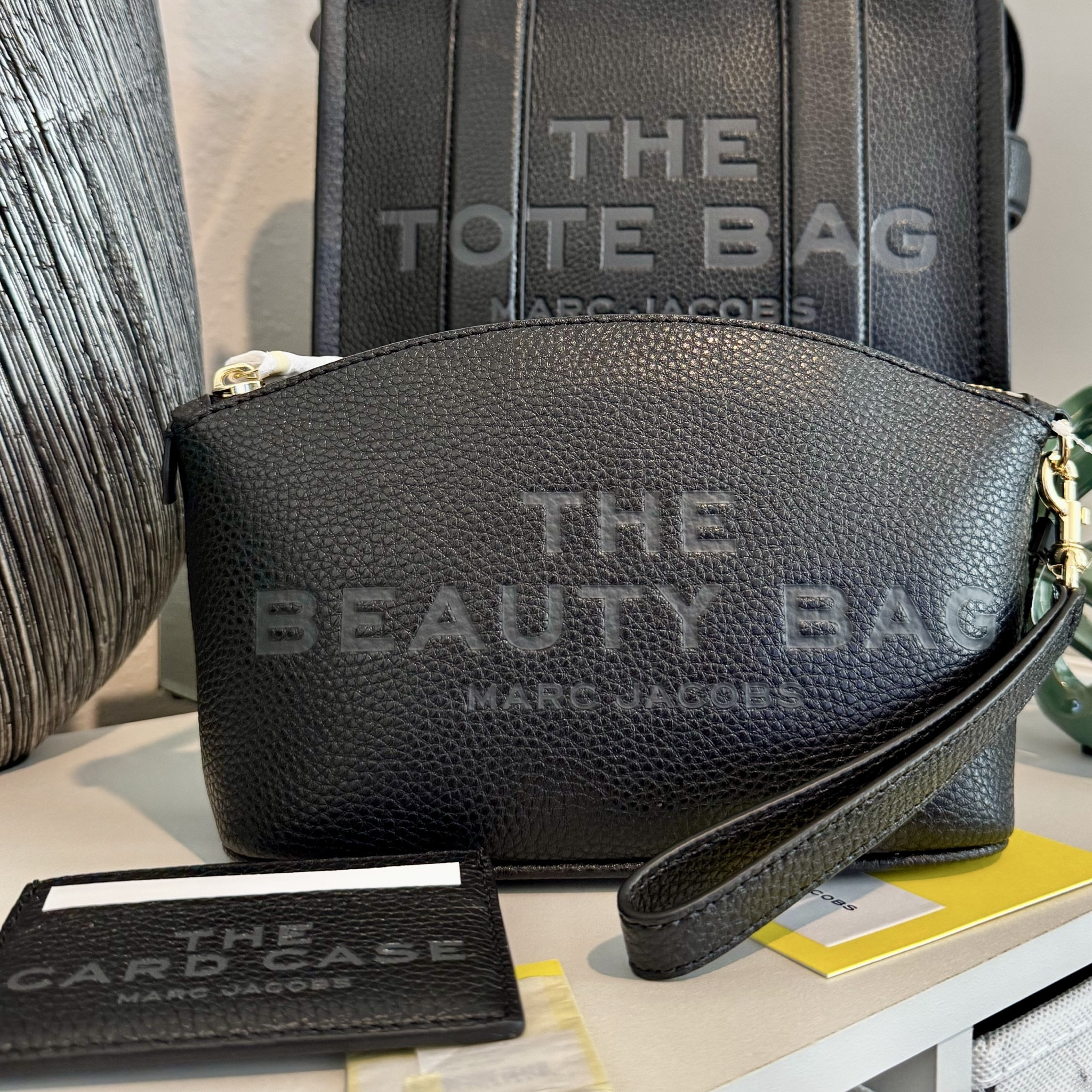 The Marc Jacobs Beauty Bag and Card Case in black are my new essentials! The beauty bag’s sleek design is perfect for organizing all my makeup, while the card case is just as soft and supple as the tote bag. Together, they make the perfect stylish duo. You won’t regret adding these to your collection! 🖤✨

#MarcJacobs #BeautyBag #CosmeticCase #CardCase

#LTKStyleTip #LTKTravel