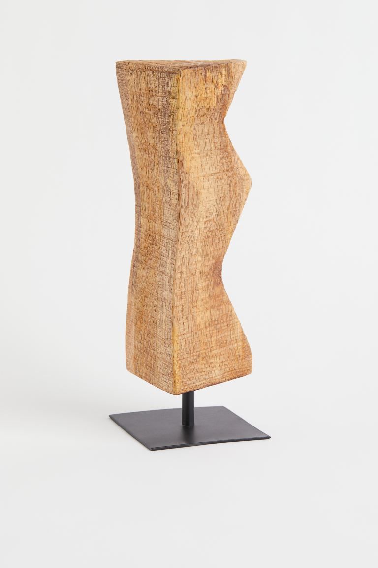 Large mango wood sculpture in an asymmetric design mounted on a metal base. Width at the widest p... | H&M (US)