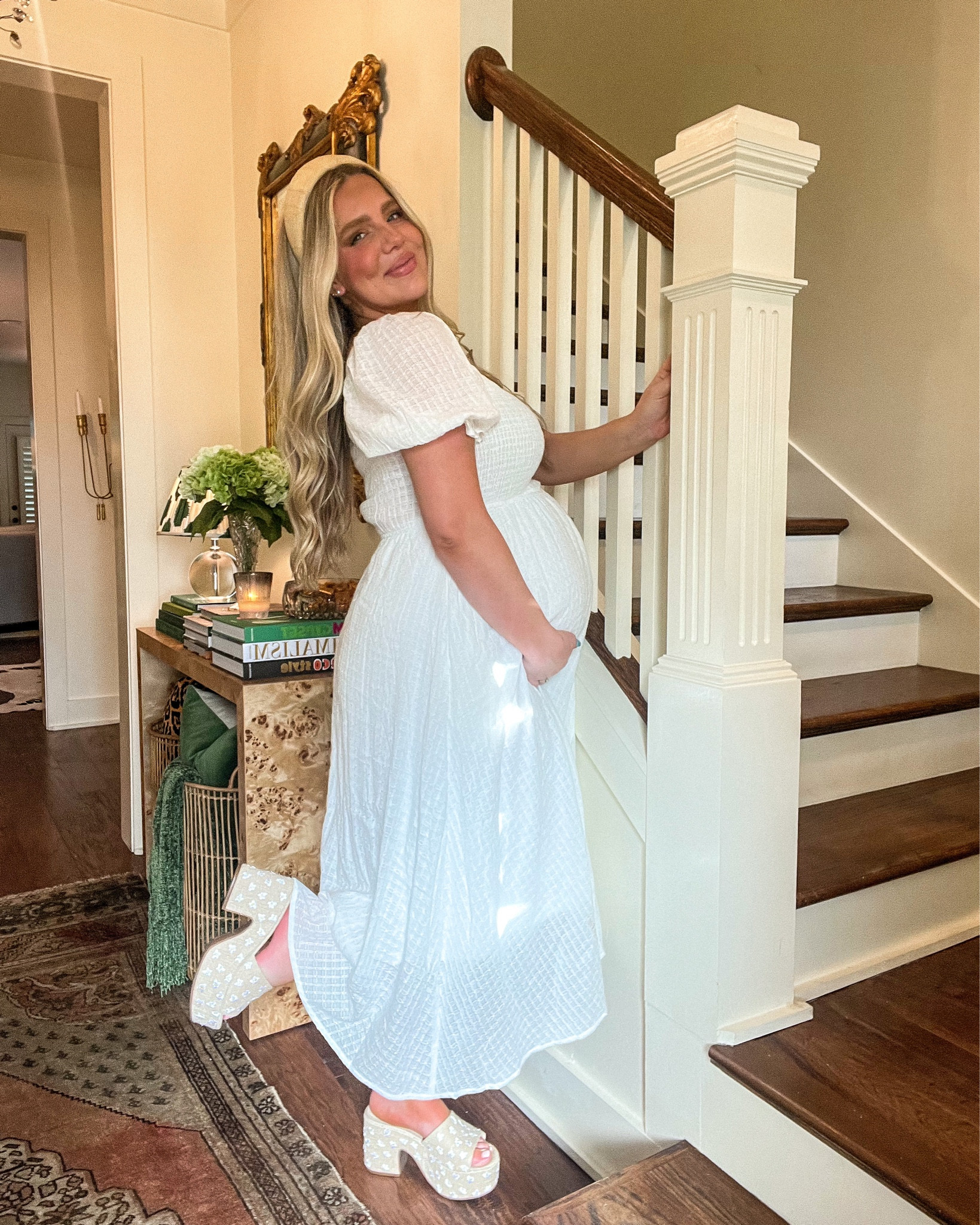 The sweetest, most classic white subtle checkered linen fabric smocked puff sleeve maternity midi dress. So perfect for so many occasions, can be dressed up or down so easily with heels or sneakers, and add accessories to change it up like this raffia headband. So comfortable, regular bra friendly!! Will be perfect for post maternity as well! Wearing a size medium here at 33 weeks pregnant, but is very stretchy so I would definitely size down.

#LTKSeasonal #LTKbump #LTKunder100