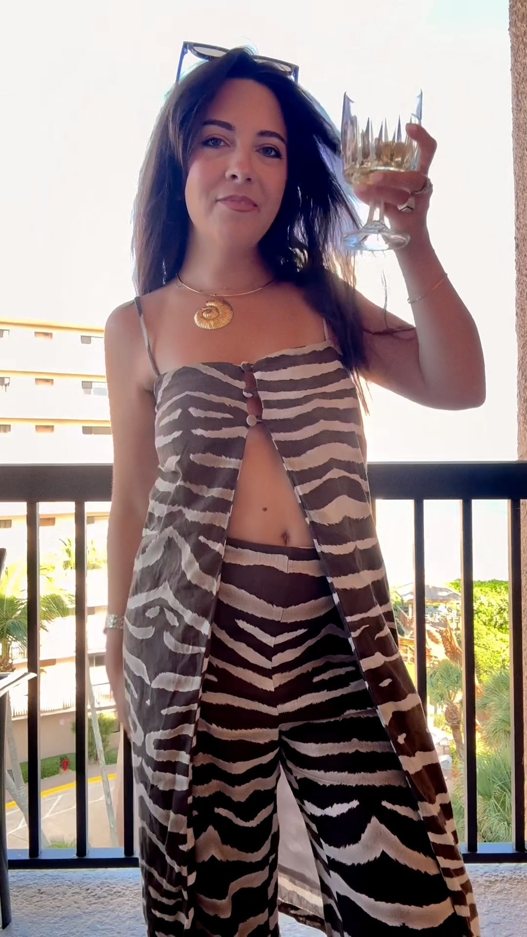 Resort dressing made easy 🖤 This zebra print two-piece set is such a good vacation look—the flowy pants + longline top make it feel effortless but still elevated. Paired with white sandals and a neutral bag for an easy summer dinner or drinks by the water.

#LTKootd #LTKSeasonal #LTKTravel