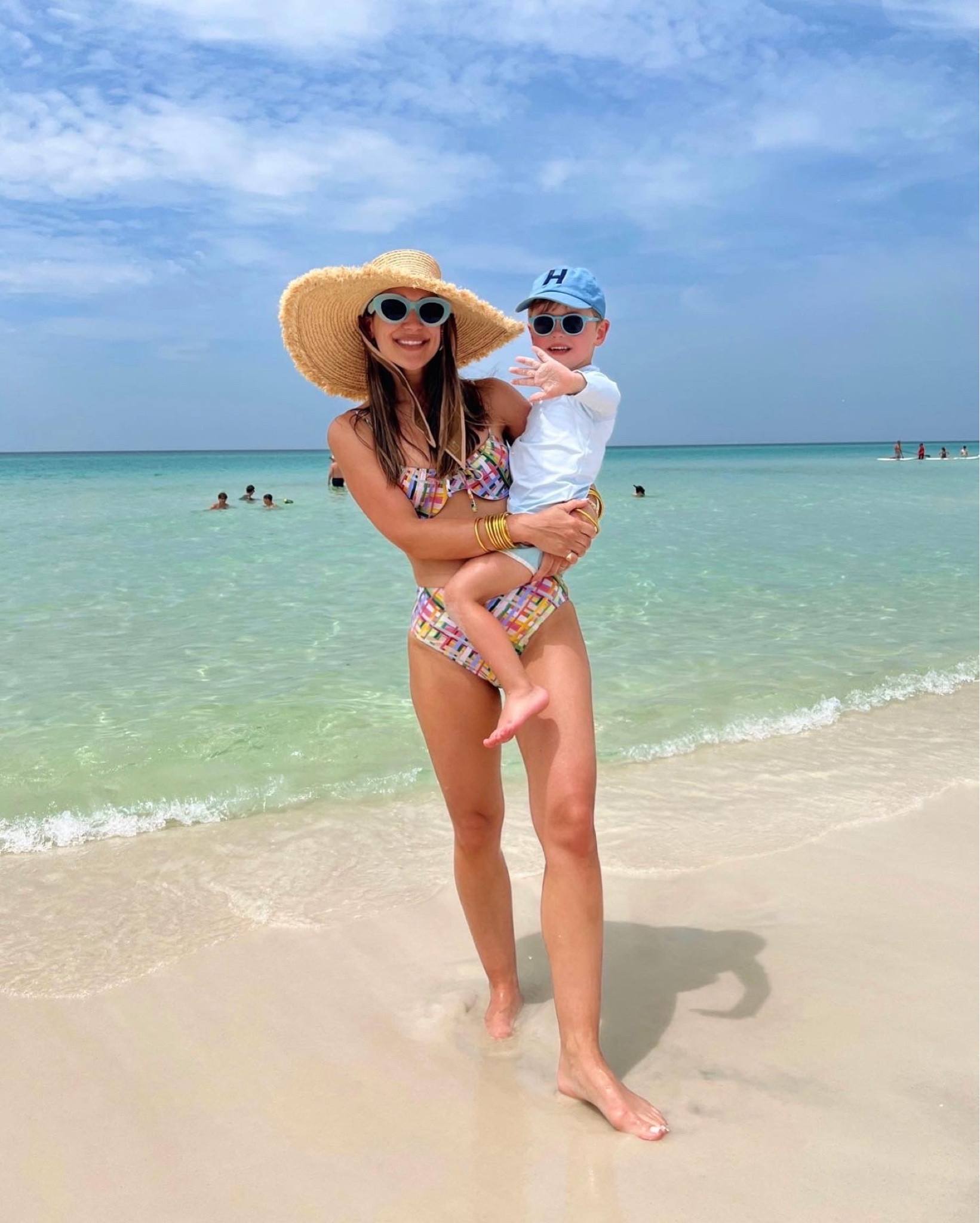 Blue sunglasses, follow suit swimsuit, fringe wide brimmed sun hat 

#LTKswim