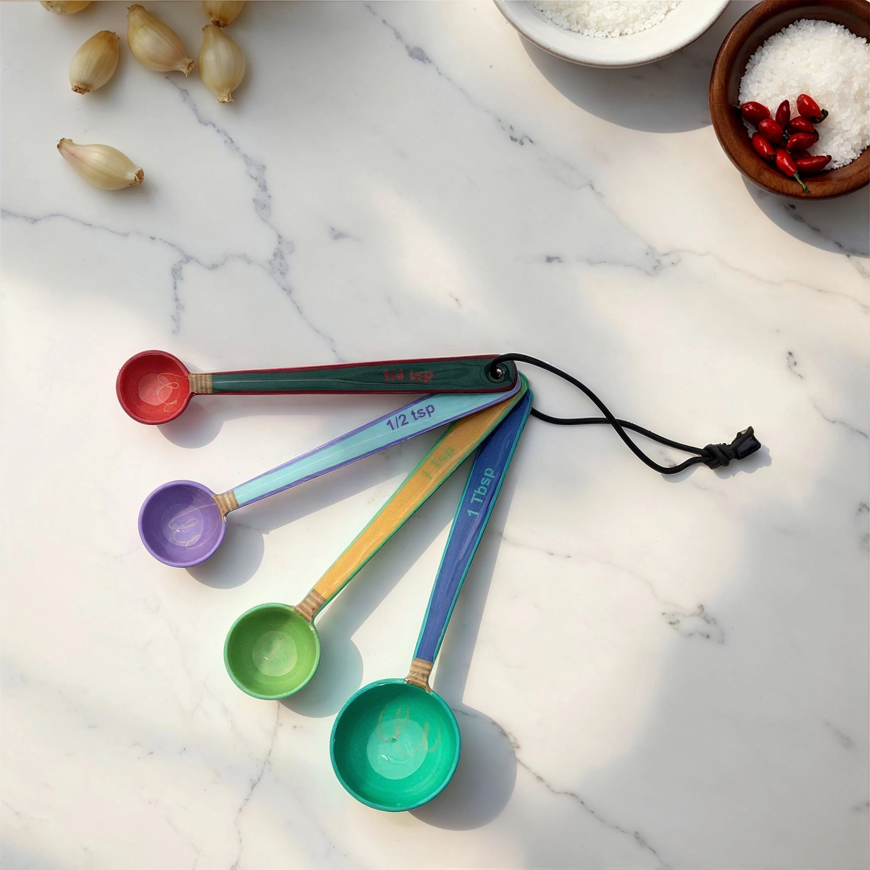 4-Piece Enameled Stainless Steel Measuring Spoons With Colored Edges And Leather Tie, Multicolor | Wayfair North America