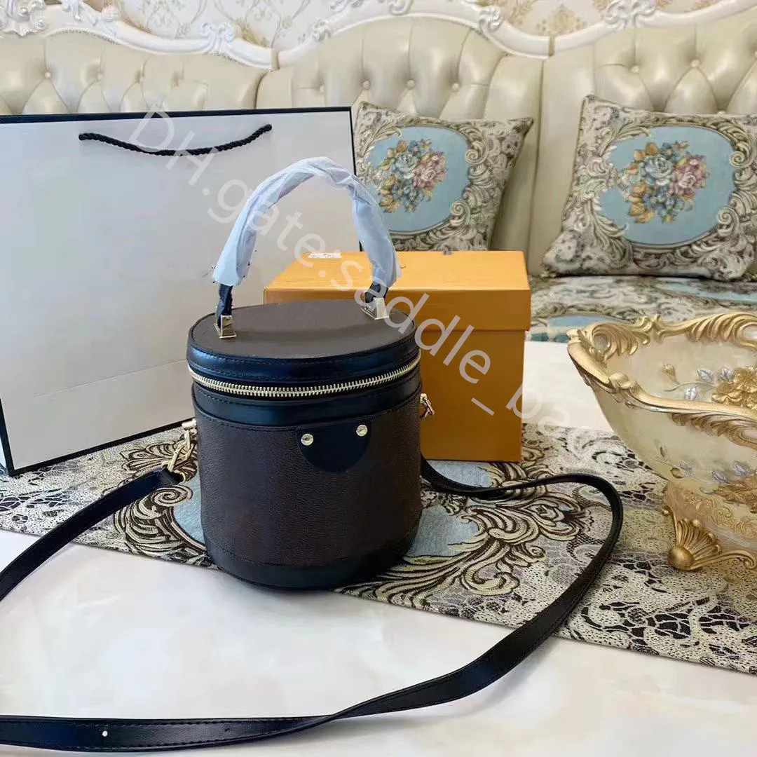 Famous Designer Women Fashion Handbags Plain Genuine Leather Rivet Zipper Barrel Bag Interior Slo... | DHGate