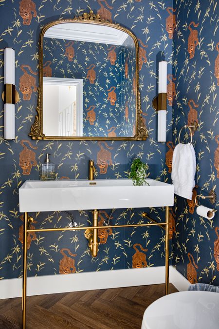 Eye of the Tiger 🐅 
I couldn’t be more excited about this makeover. 
Swipe for the before and prepare yourself. 
I think this is my favorite powder room design of all time 🤩



#LTKhome