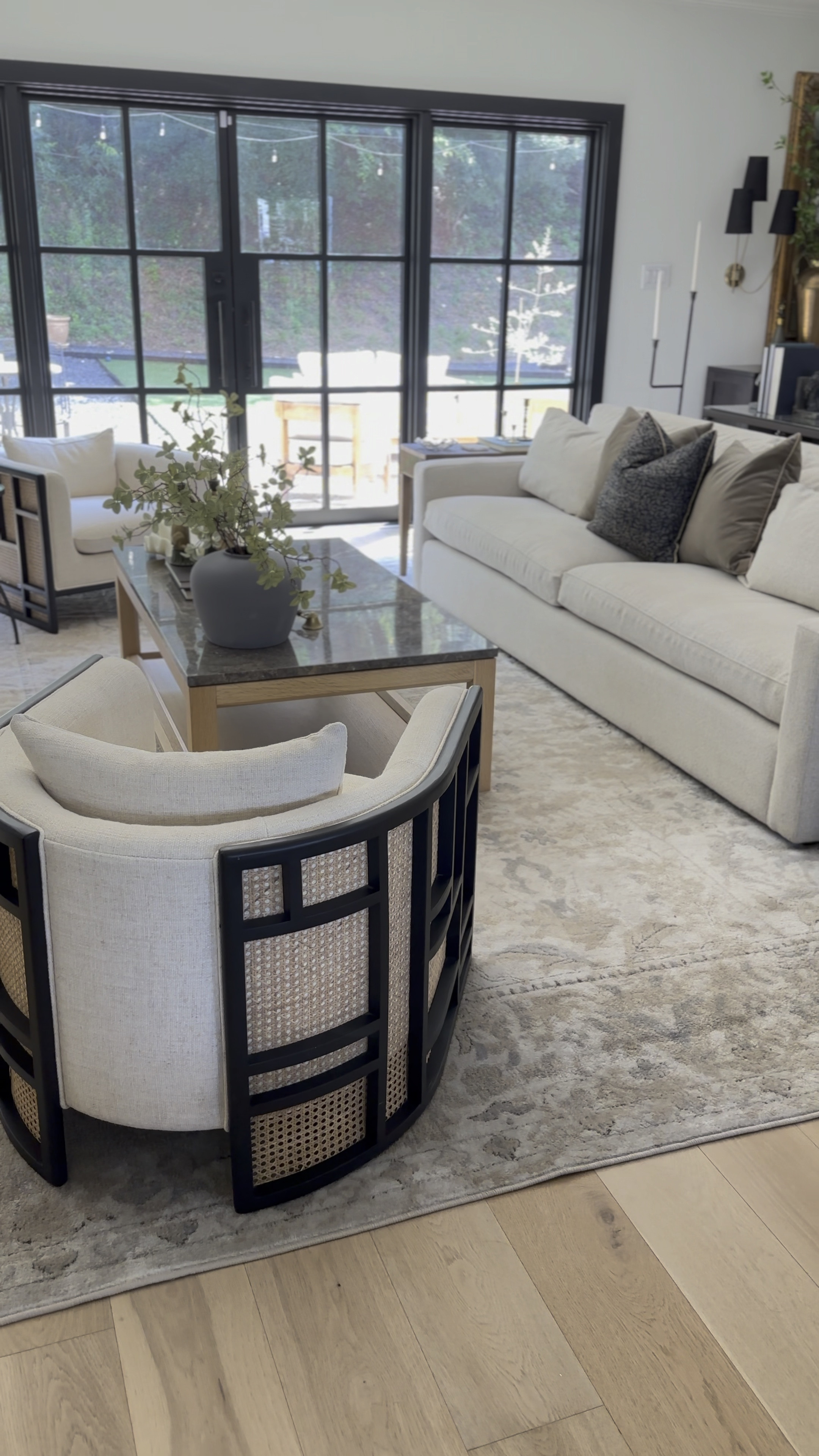 Our living room! I recently shifted our accent chairs on the angle to create a conversation style layout and it feels so much more open in here! And I chose the extra deep Ashby sofa from Arhaus - it’s so comfortable and great for lounging!

#LTKstyletip #LTKsalealert #LTKhome