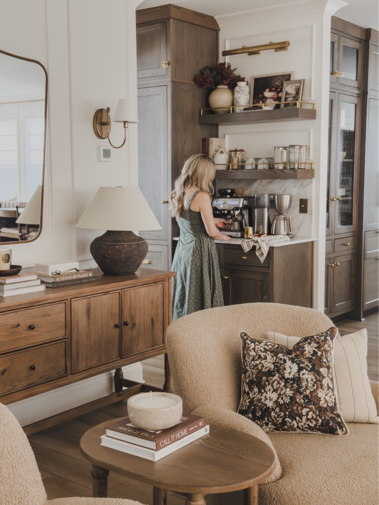 Fall coffee bar views with a new look! Rearranging my living room just a bit while still adding in touches of seasonal decor true to my style — timeless, collected, and a little extra moody vibes for cozy season.

Home finds, neutral home inspo, collected style, timeless home inspo, fall refresh, coffee bar views, neutral wood tones, living room style, wooden console table, swivel accent chair, moody table lamp, brass detail, console table, accent table, wall sconce, wall mirror, cozy throw pillow, Abercrombie, Four Hands, Wayfair, found it on Amazon, shop the look!

#LTKSeasonal #LTKHome