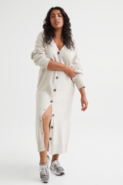 Conscious choice  Long, loose-fit dress in a soft, fine knit with wool content. V-neck, buttons a... | H&M (US)