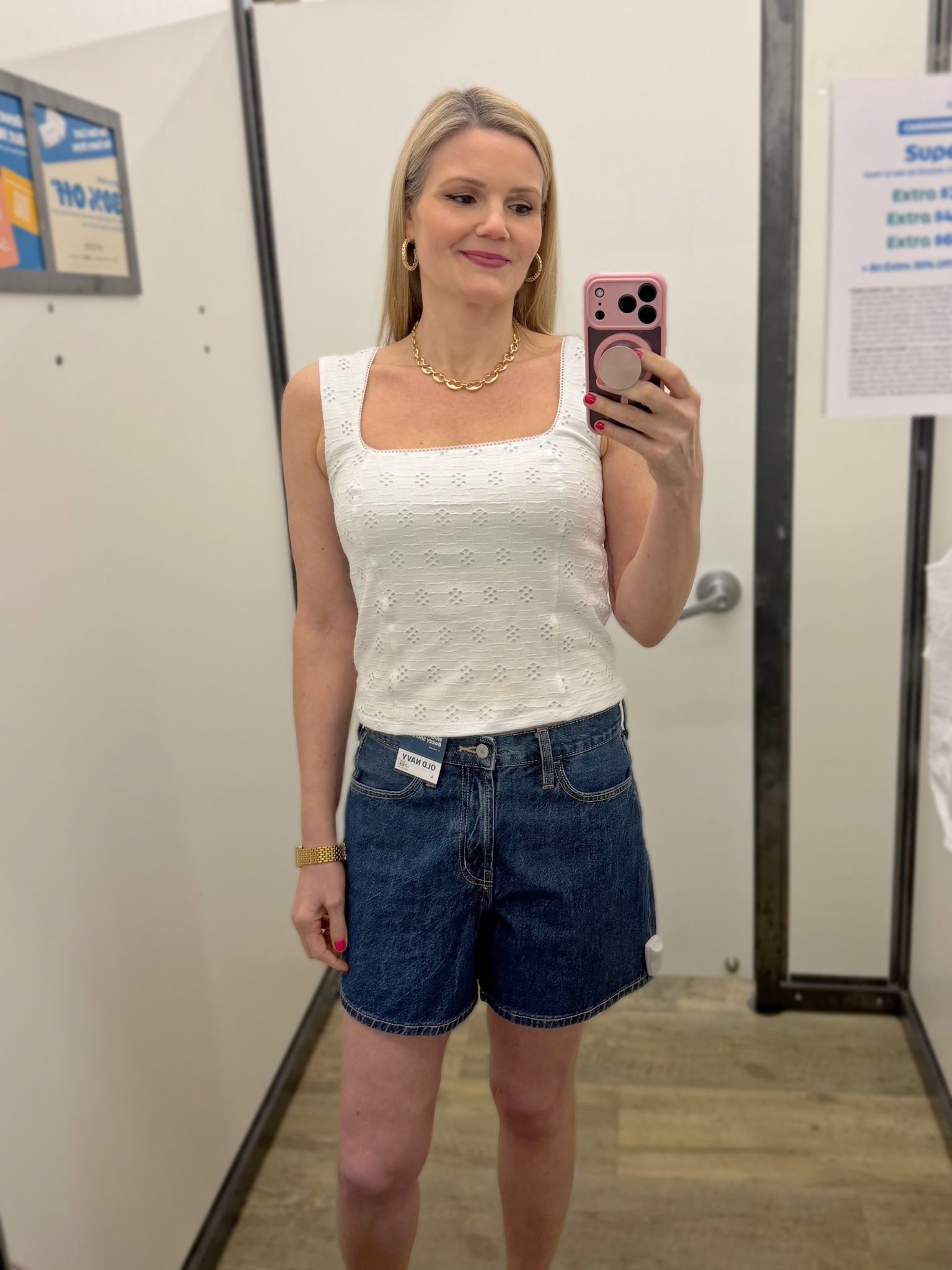 Eyelet tank in size medium and loose denim shorty’s in size 4 (they run big!)  

#LTKSaleAlert #LTKTall #LTKOver40