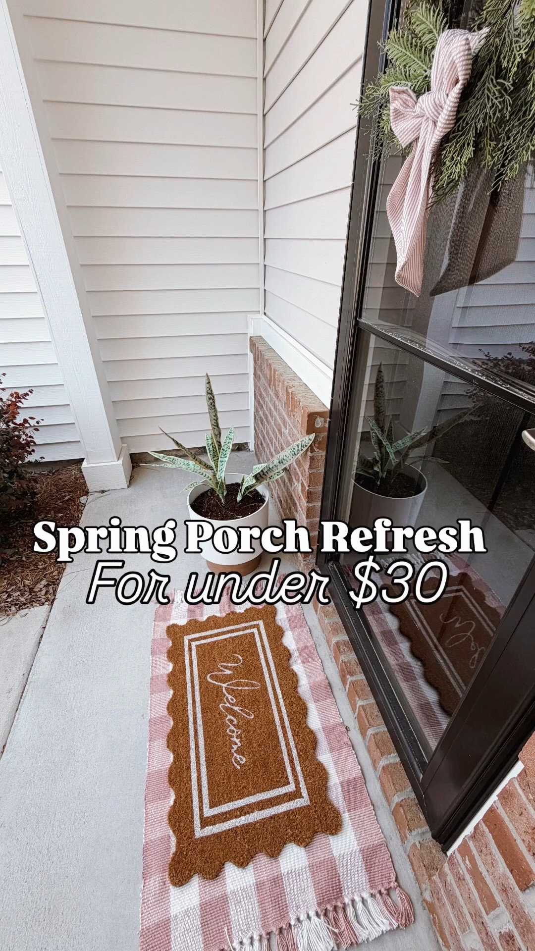 easy and affordable spring front porch refresh under $30 🤍 layered outdoor rugs + a scalloped welcome mat + simple wreath and bow = instant curb appeal without the price tag. 

Reusing a wreathe from Christmas by adding a new gingham bow to it & have had the UV snake plant & planter for years! 

spring porch decor affordable porch refresh layered doormat outdoor rug pink gingham rug scalloped welcome mat front porch ideas budget home decor spring entryway coastal porch decor grandmillennial style walmart amazon my texas house uv artificial plant uv snake plant restyling 

#LTKdayinmylife #LTKSeasonal #LTKHome