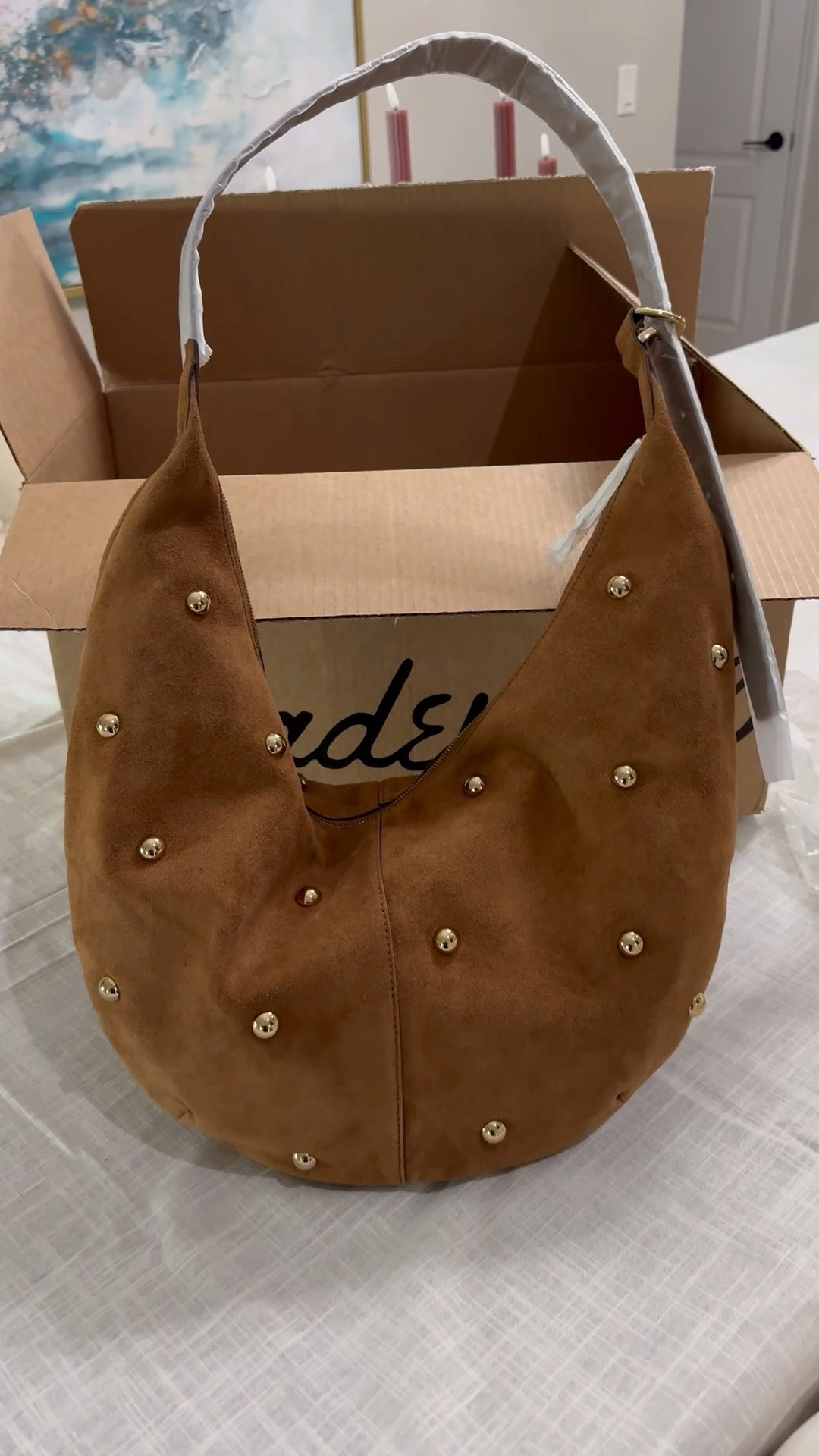 I love this curved suede bag with studs so much that I got an early Christmas present for myself!

#LTKHoliday #LTKSeasonal #LTKGiftGuide
