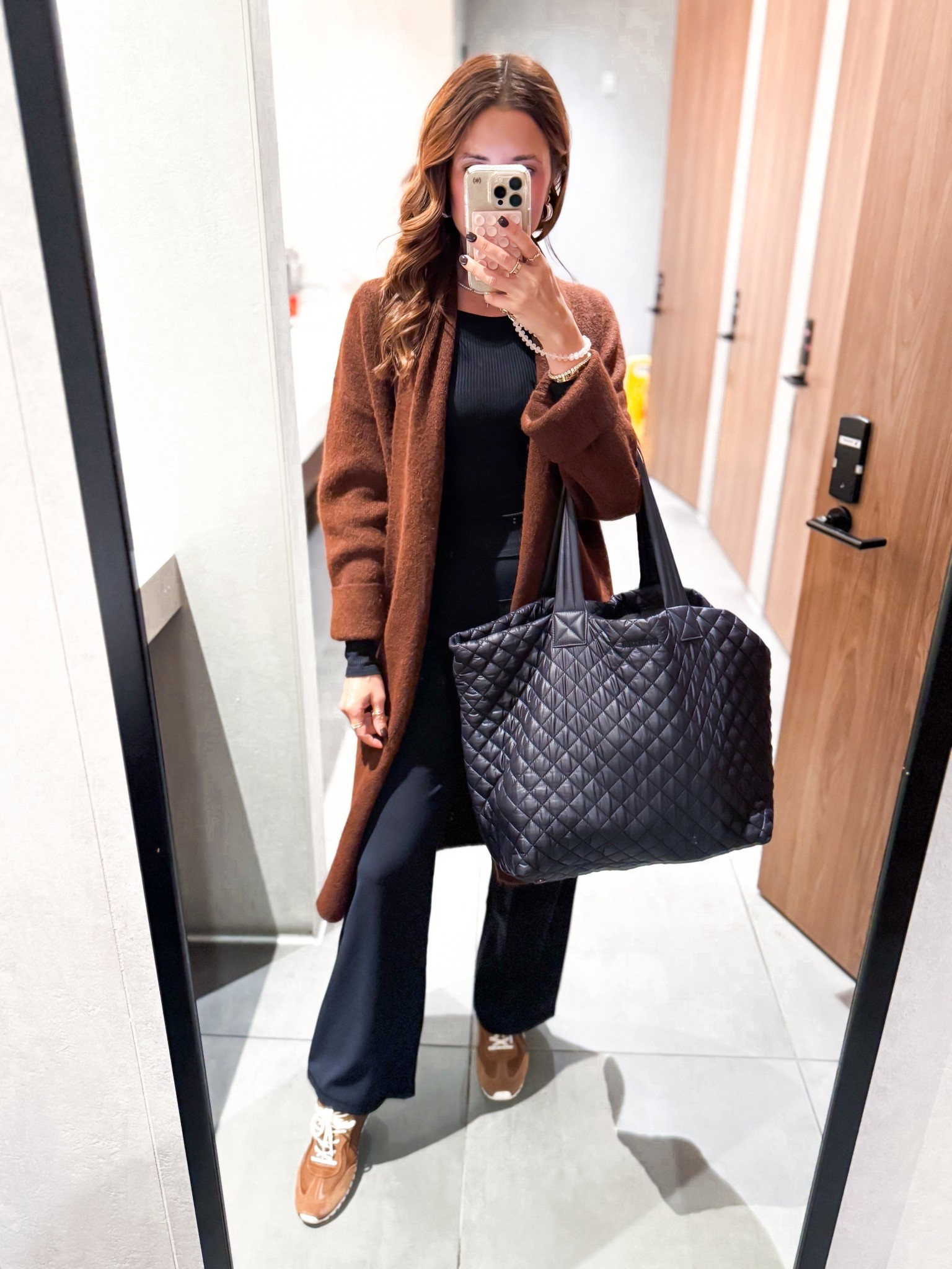 Today’s travel outfit. Amazon wide leg yoga pants + length options in XXS short (for 5’1-5’3). Amazon cardigan in small. Tory Burch suede sneakers - I went up half a size. MZ Wallace deluxe large tote. Alo long sleeve in XS. 

#LTKShoeCrush #LTKItBag #LTKTravel