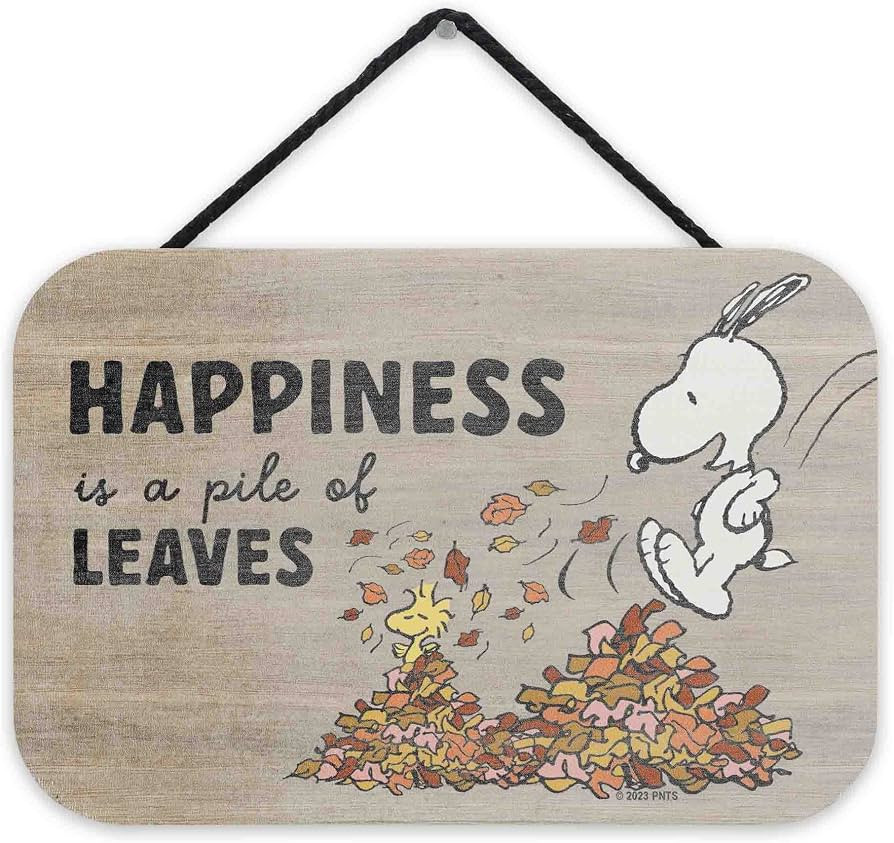 Peanuts Snoopy Happiness Is a Pile of Leaves Hanging Wood Wall Decor | Amazon (US)