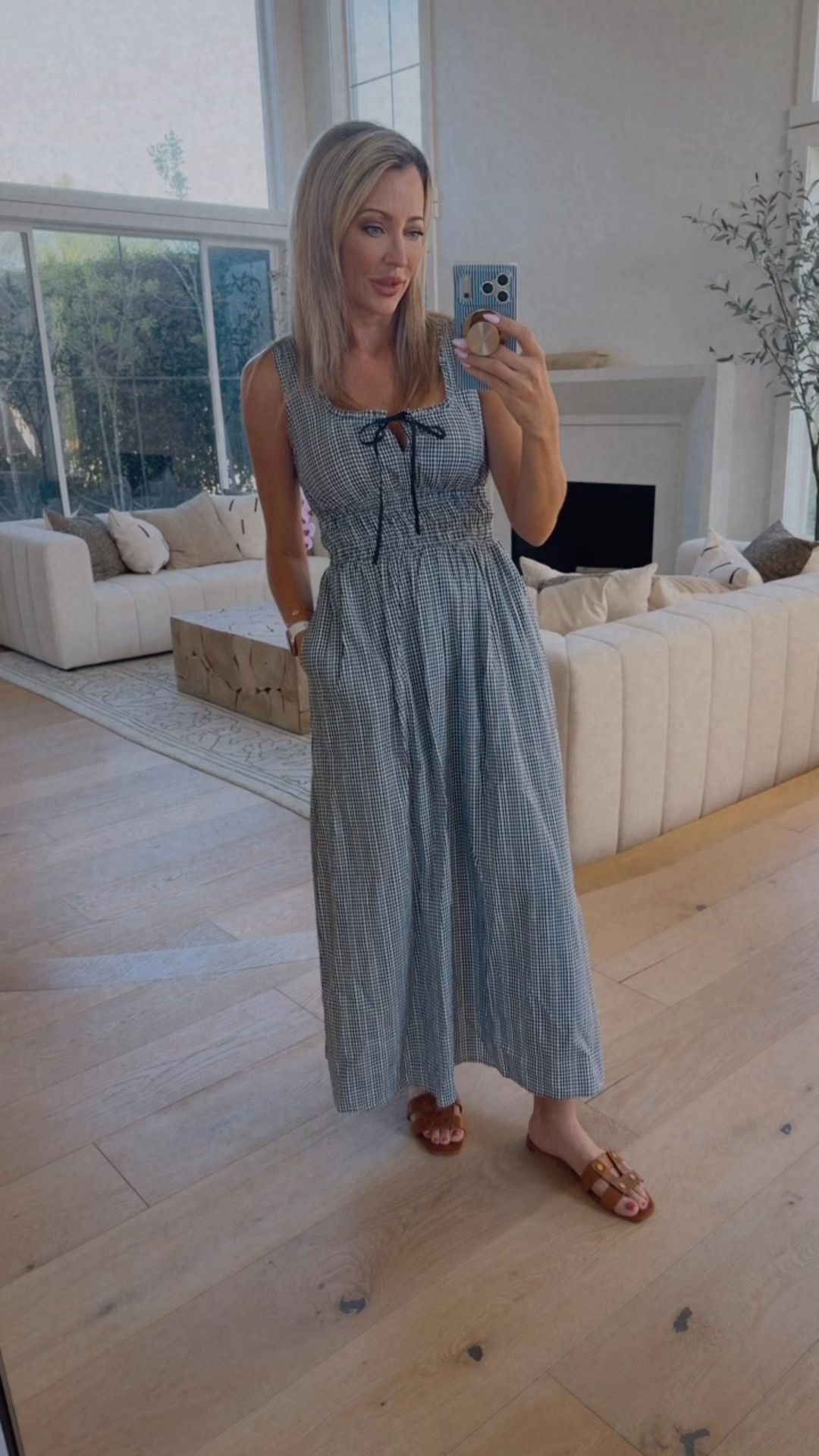 Perfect spring dress! I'm in my true size small. Black and white gingham dress. Easter dress mother's day dress summer dress travel dress. She's a keeper!!

#LTKootd #LTKOver40 #LTKSeasonal