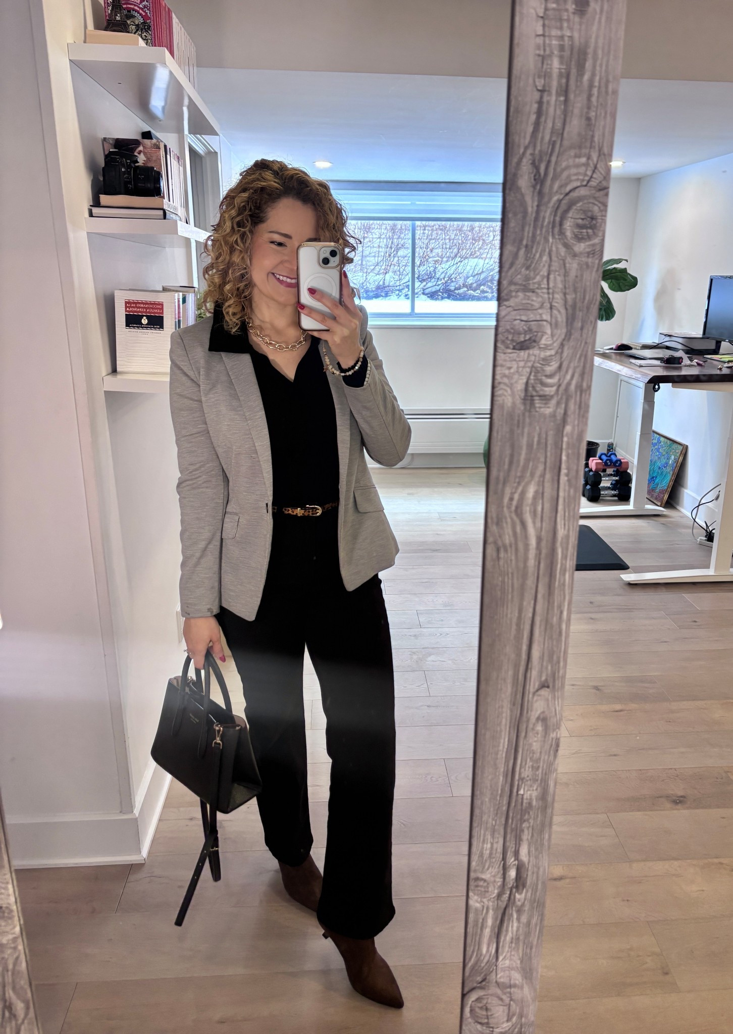 Modern monochrome work outfit with a fitted grey blazer, all-black base, statement belt, and brown ankle boots. A powerful and sophisticated office look that transitions perfectly from work to after-hours. Ideal for a chic and professional capsule wardrobe.

#LTKstyletip #LTKcanada #LTKworkwear