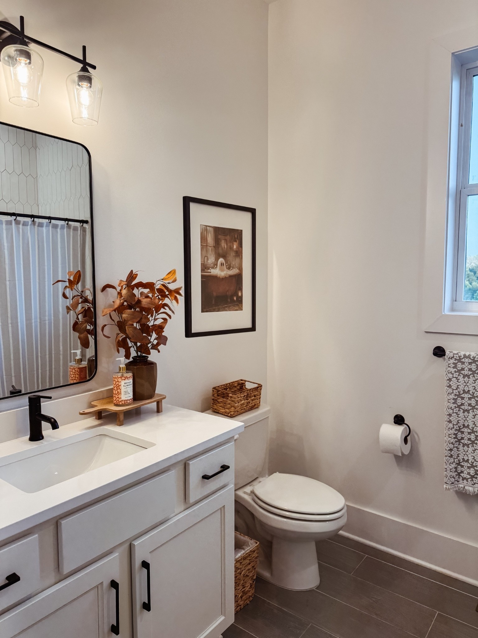 Fall Guest Bathroom Decor | Farmhouse Bathroom | Halloween Funny Ghost Bath Tub Print | Rusted Eucalyptus Faux Flower Arrangement | Wooden Bathroom Tray Stand | Woven Trashcan, Natural Weave Waste Basket | Woven Basket | Black & White Matted Frame | Striped Shower Curtain

#LTKSeasonal #LTKHome