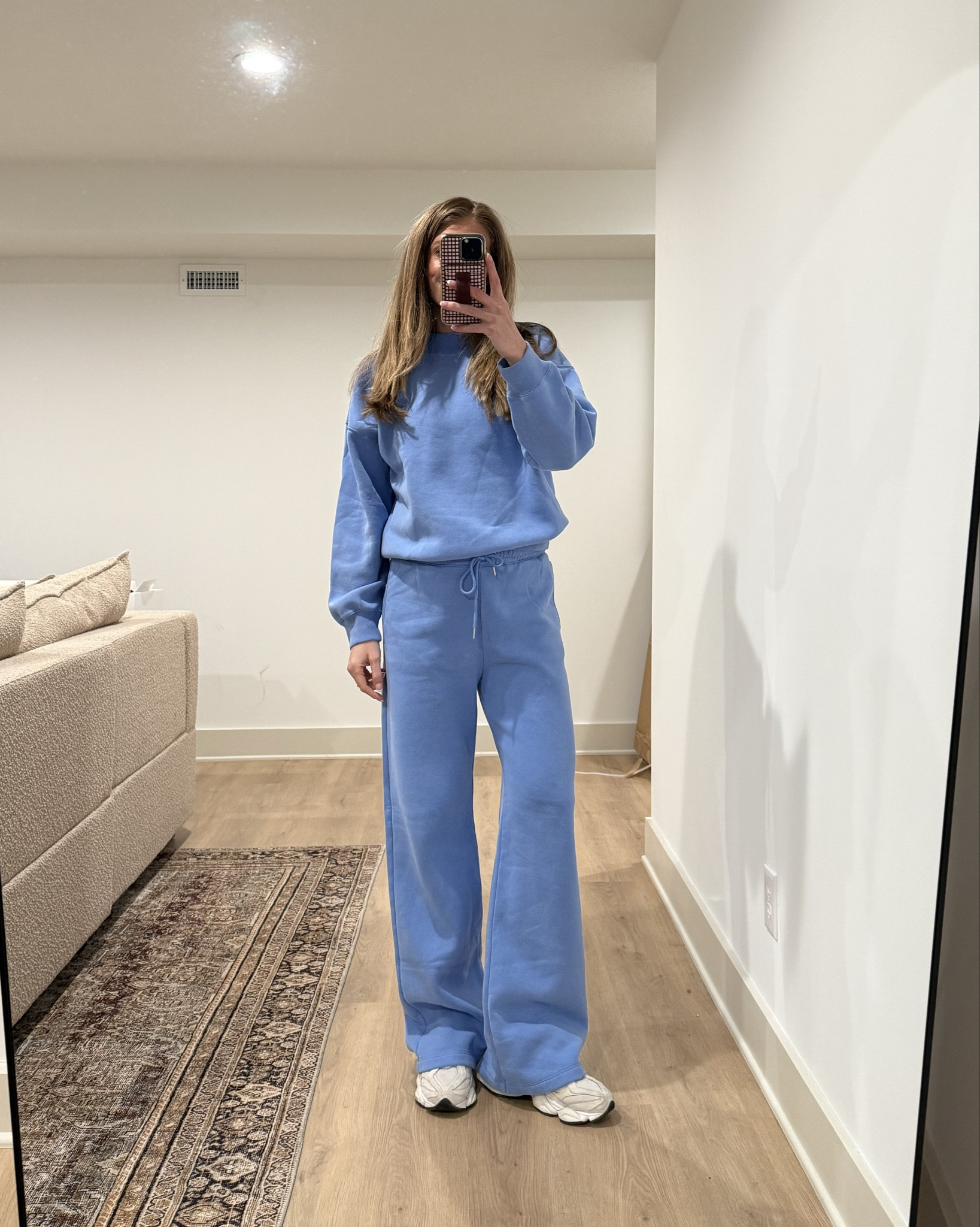 Wore this lounge set to a chill girls night! I have this in a handful of colors. One of my faves! Wearing a medium tall in the sweatpants and a medium in the sweatshirt

#LTKTravel #LTKdayinmylife #LTKootd