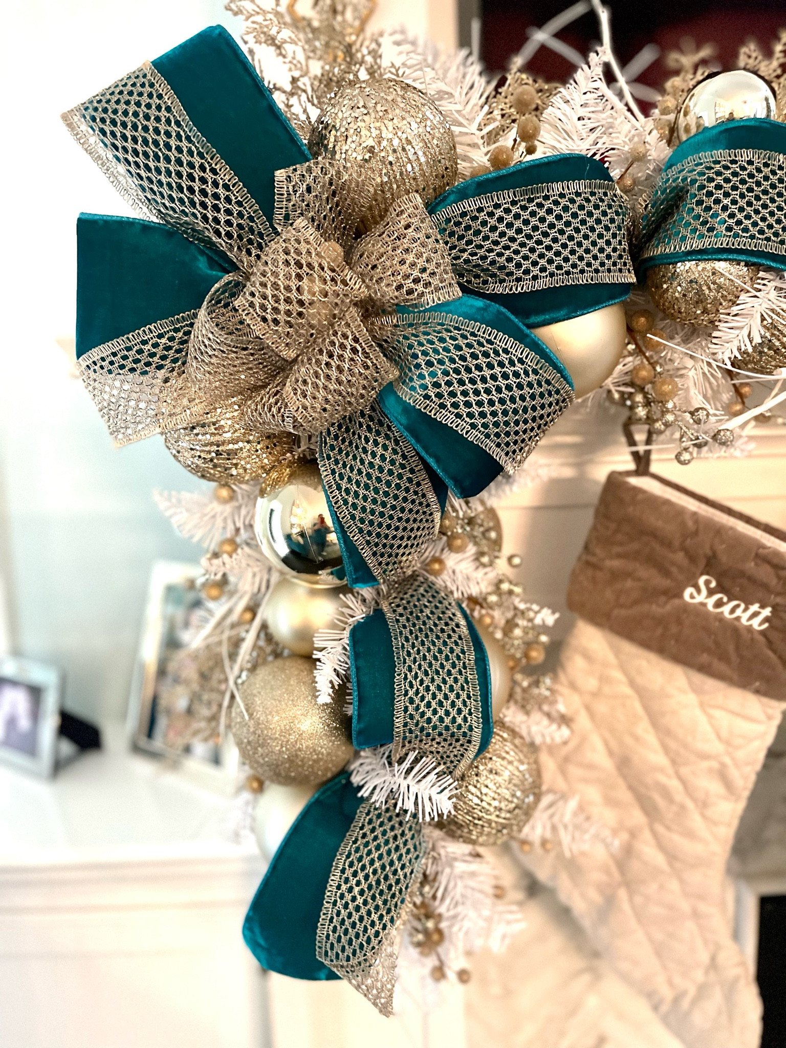 Custom made white Christmas garland with 4” teal velvet ribbon. 

#christmasgarland #garland #whitegarland #christmasbow 

#LTKHome #LTKSeasonal