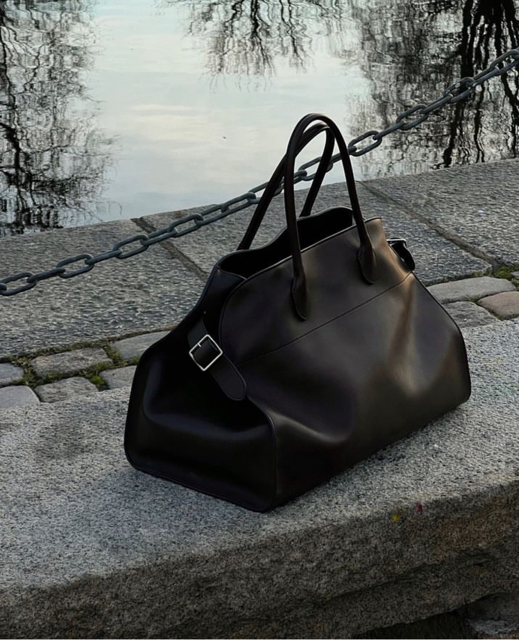 The Row’s Soft Margaux 15 is testament not only to fine craftsmanship, but to the strength and beauty of simple, timeless designs. The leather design features gusseted side panels and a compartment lined with pockets.

Hiiii, lovely! Follow my shop @TheChiccEdit to shop this post, and get my exclusive app-only content! So glad you're here!

Amazon Influencer
www.Amazon.com/shop/thechiccedit

Ltkfind, ltkmidsize, ltkover40, ltkunder50, ltkunder100, chic, aesthetic, trending, stylish, fall home, fall style, minimalist style, affordable, trending, fall fashion, fall outfit, Christmas, holiday season, Christmas outfit, New Year’s Eve style, decorations, home, decor #bag #handbag #therow #elevatedstyle #black 

#LTKitbag #LTKstyletip #LTKover40