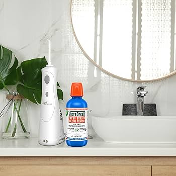 TheraBreath Fresh Breath Oral Rinse - Icy Mint | Fights Bad Breath | Certified Vegan, Gluten-Free... | Amazon (CA)