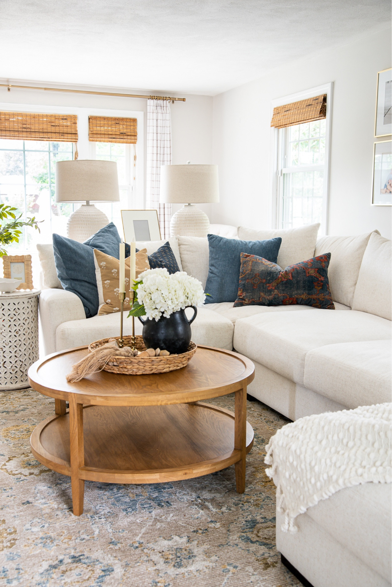 Home decor for your living room, including throw pillows, coffee table, lamps, vases, curtains, rattan shades, rug

#LTKfamily #LTKhome