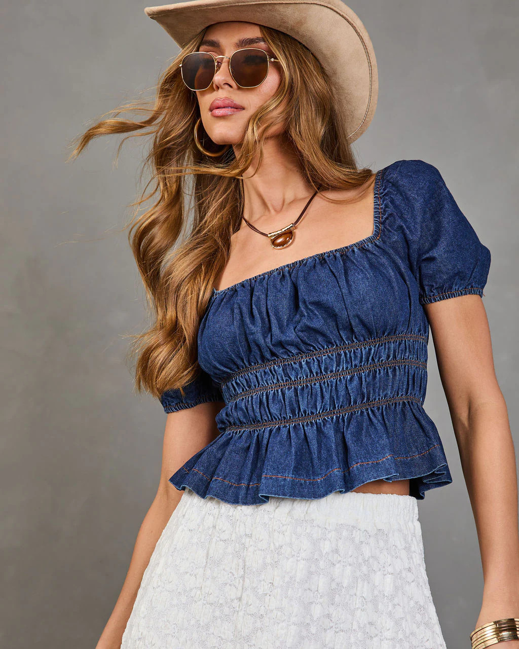 Navelle Smocked Denim Peplum Top | VICI