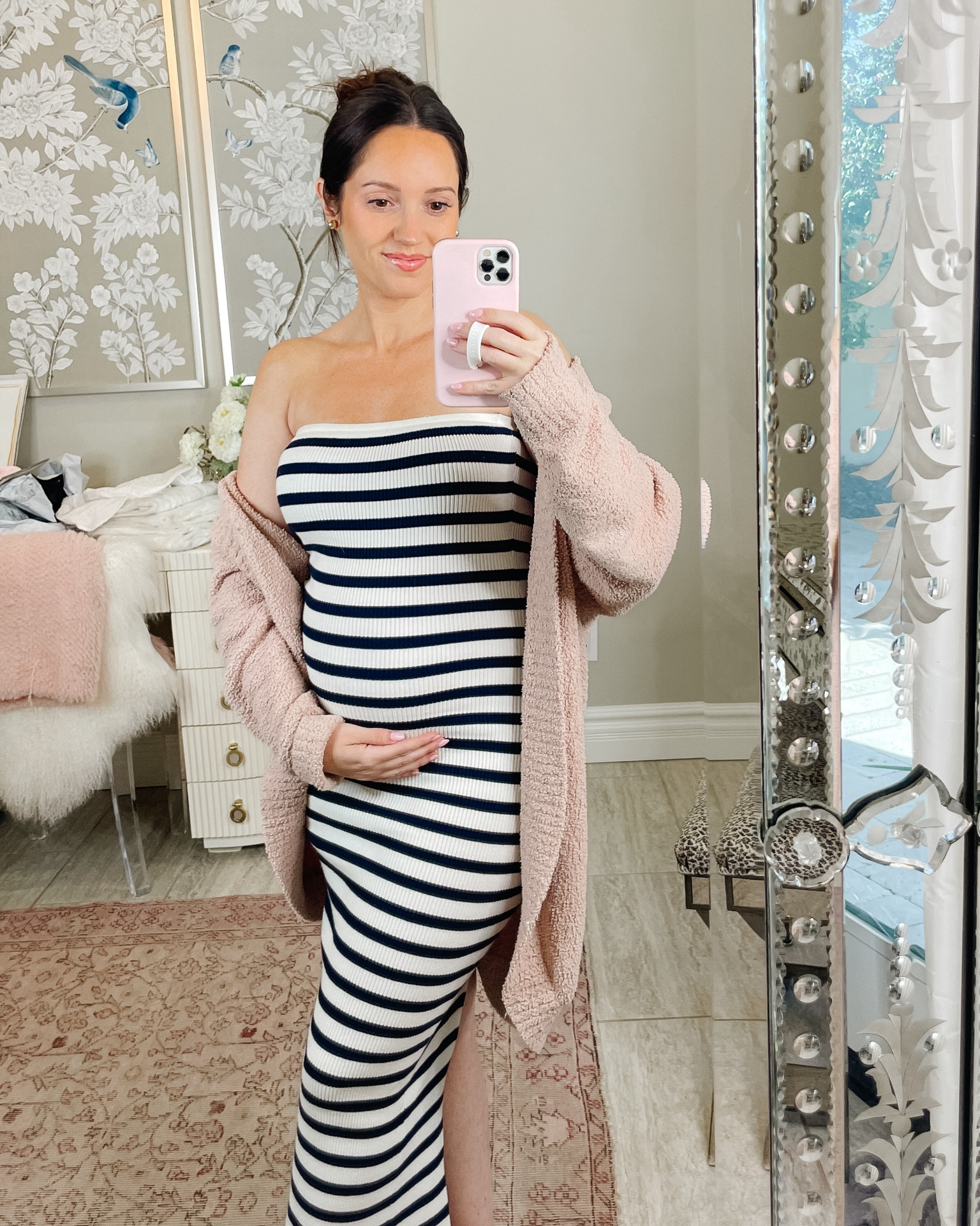 Been wearing this maternity friendly bodycon dress nonstop! It’s a super thick stretchy knit material. Very high quality! I sized up to a SMALL and it still had a ton of stretch! Very bump friendly! I’m 17 weeks here. 

#LTKBump #LTKFindsUnder100 #LTKxNSale
