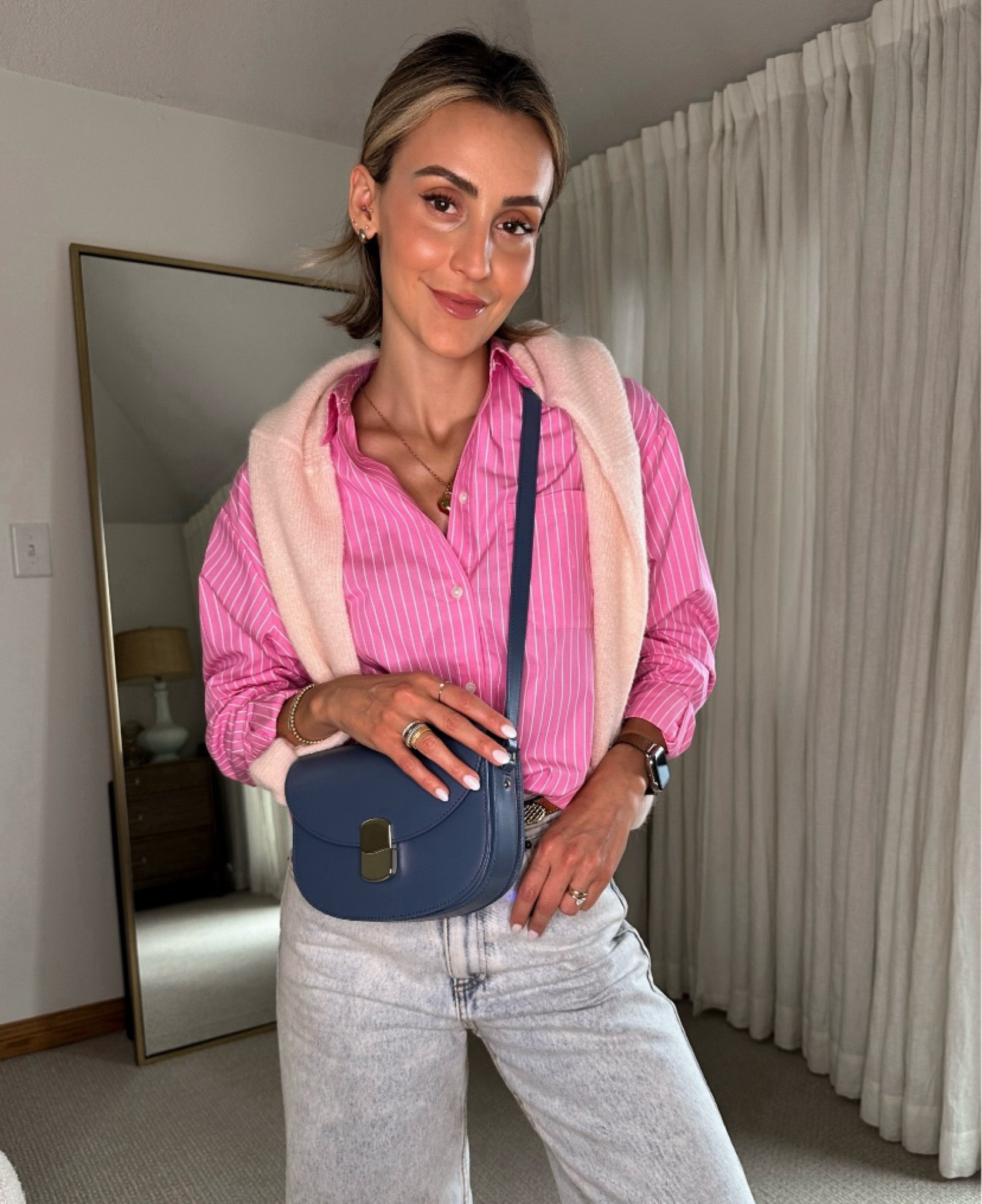 Pink stripes are sure to add some cheer to all of your winter outfits! This combo would make for such a cute Valentine’s Day outfit, whether you’re going out to dinner or hanging with friends. The button down shirt fits oversized (so trendy right now) and this blue bag pairs wonderfully with denim and navy looks for the office. Another bonus? I love that this outfit gives spring vibes while still offering warm and cozy coverage! 

#LTKOver40 #LTKStyleTip #LTKSeasonal