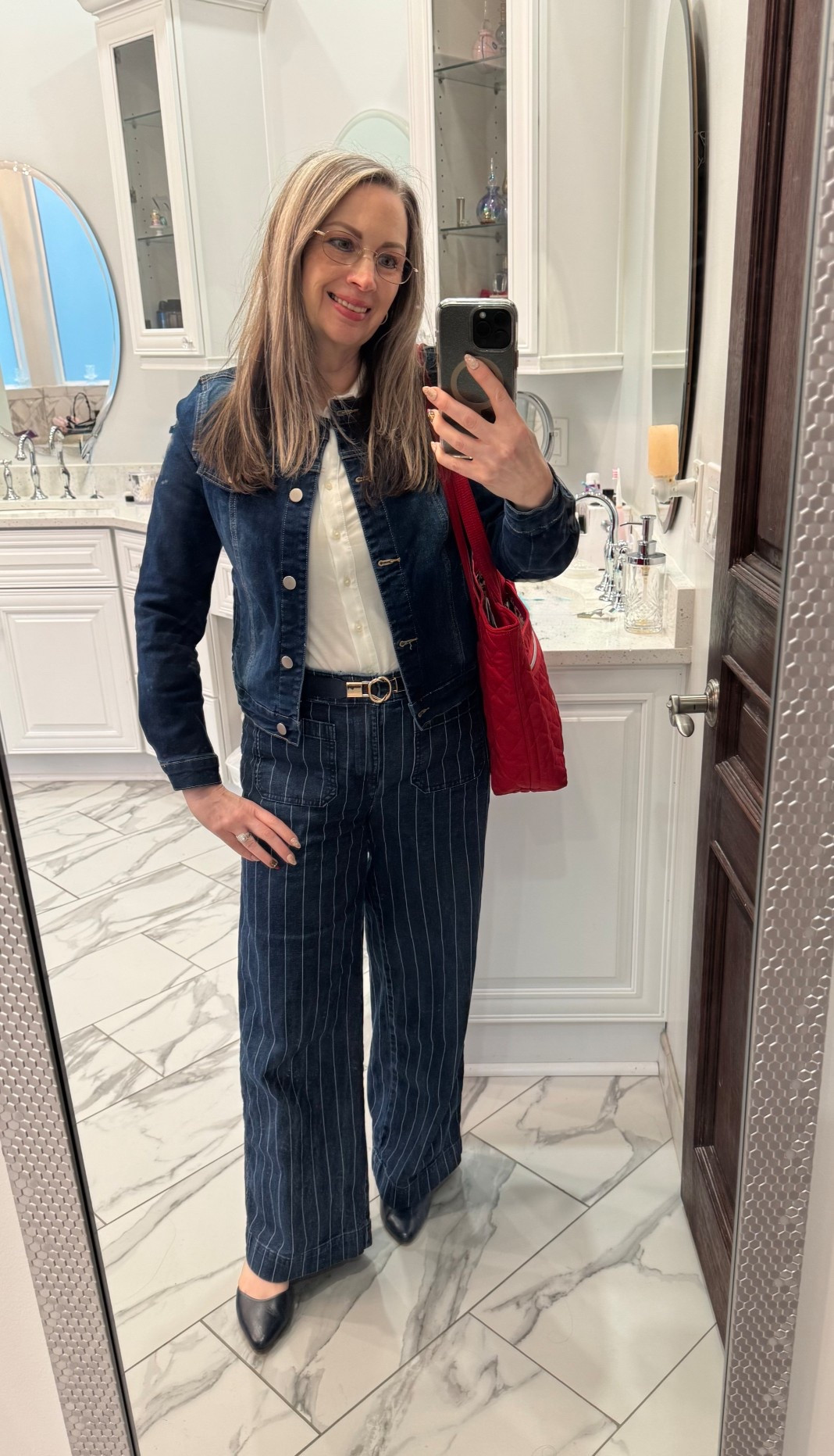The denim suit. Always a classic. 

I’m wearing my favorite denim jacket with my new pinstripe wide leg jeans from LOFT, and a classic off-white button-down shirt. I’ve got my favorite Vera Bradley tote in tow. I have loved wearing my navy shoes from Talbots this season. They have a little bit of a wedge and are very comfortable. I’ll tag something similar since these were from a few years ago. 
Thin belts are coming back into style and the one I’m wearing comes in a pack of three! Affordable, versatile, and they stretch.

I’ve been talking about this jean jacket since the fall. It is fitted, without a collar, classic lines and very comfortable. I love the color. It is dark but bright and warm.
I love the pinstripe wide leg jeans. They are light enough to wear when the spring and summer comes. We live in a warmer climate so I’ll get a lot of use out of them throughout the seasons. These are very popular right now and selling fast.
I’m thinking about purchasing another Vera Bradley tote because I love the quality, durability, and versatility it provides. It’s not only the perfect Mom tote, but I love it for running errands, and throwing my iPad in for when I want to write on the go 💕

All of these pieces will fit seamlessly into your wardrobe and pair nicely with everything you own.

#hocspring #widelegjeans #widelegpsnts #denimsuit #denimpants #jeanjacket #momjeans

#LTKmomlife #LTKootd #LTKdayinmylife