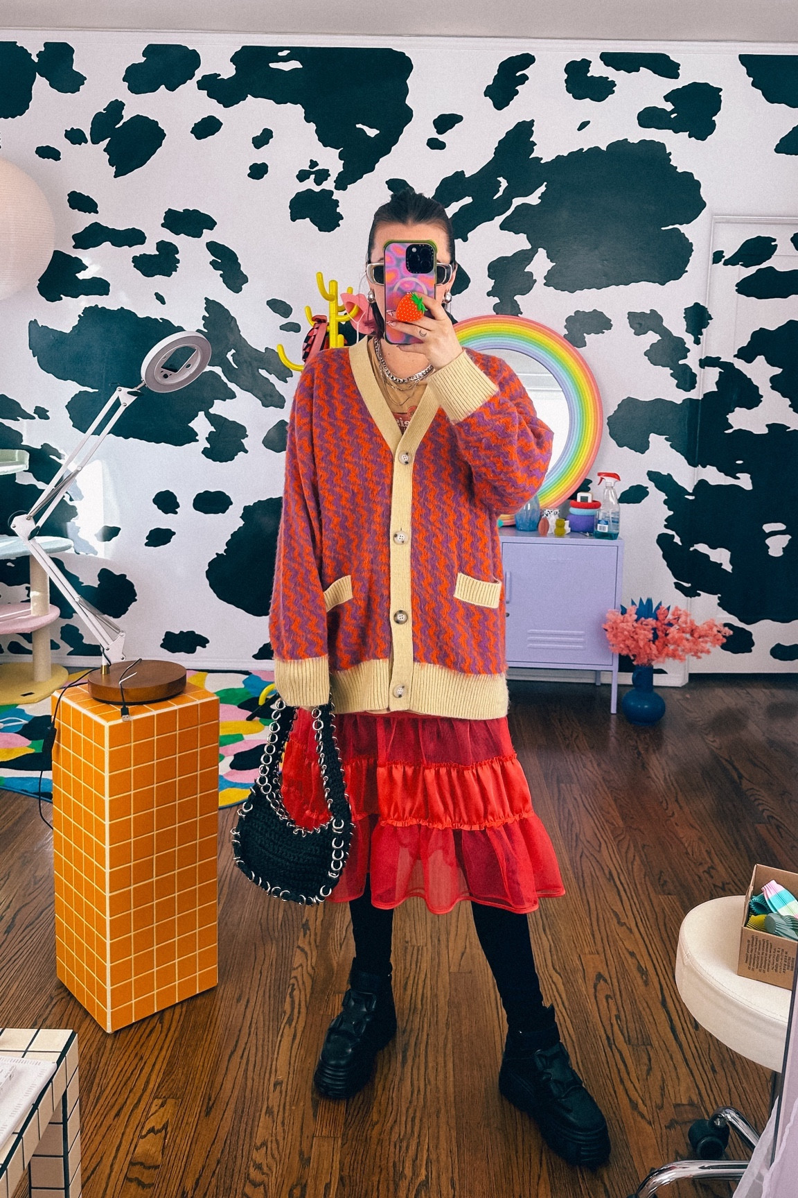 Layered up for a chilly day in Los Angeles 💖

Champagne wears a red and purple, striped cardigan, a red lace, frill skirt, black leggings, black chunky, fell, Crow shoes, black mesh, knitted woven purse with silver embellishment. Silver necklace and silver hoop earrings.

Dopamine dressing, maximalist, Maximalism, vibrant, colorful mix matched, layered winter, cold, eclectic vintage 

#LTKSeasonal #LTKstyletip #LTKitbag