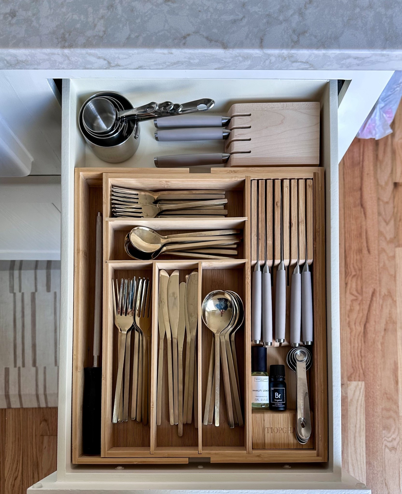 Newly organized silverware drawer! Includes space for my steak knives and measuring cups and spoons 

#LTKHome #LTKdayinmylife