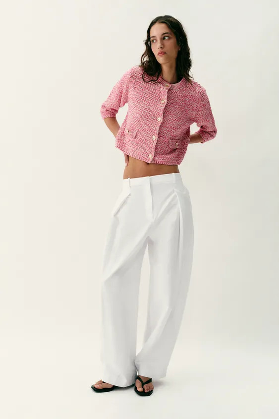 Round neck jacket with sleeves below the elbow. Front flaps. Front button closure. | Zara US
