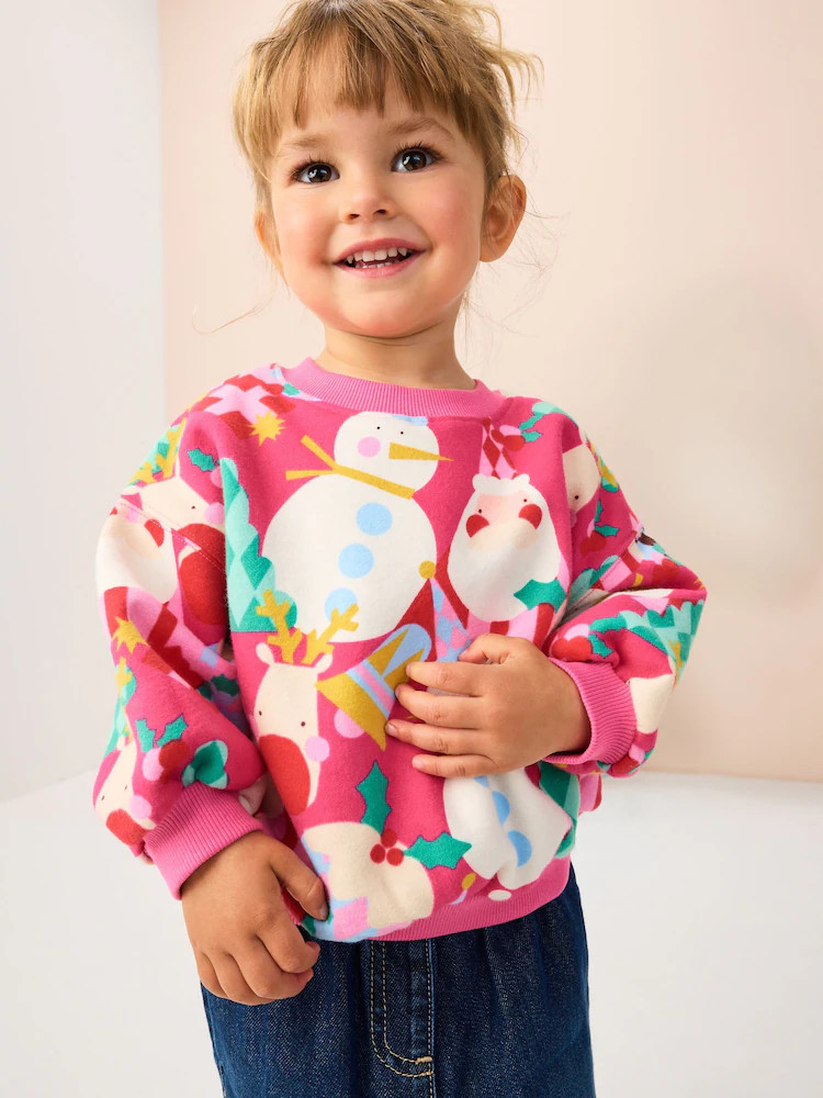 Buy Bright Pink Christmas Print Crew Neck Sweatshirt (3mths-7yrs) from Next USA | Next US