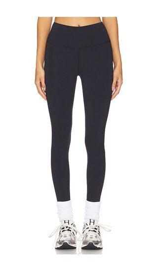 WarmWell Stirrup Legging in Black | Revolve Clothing (Global)