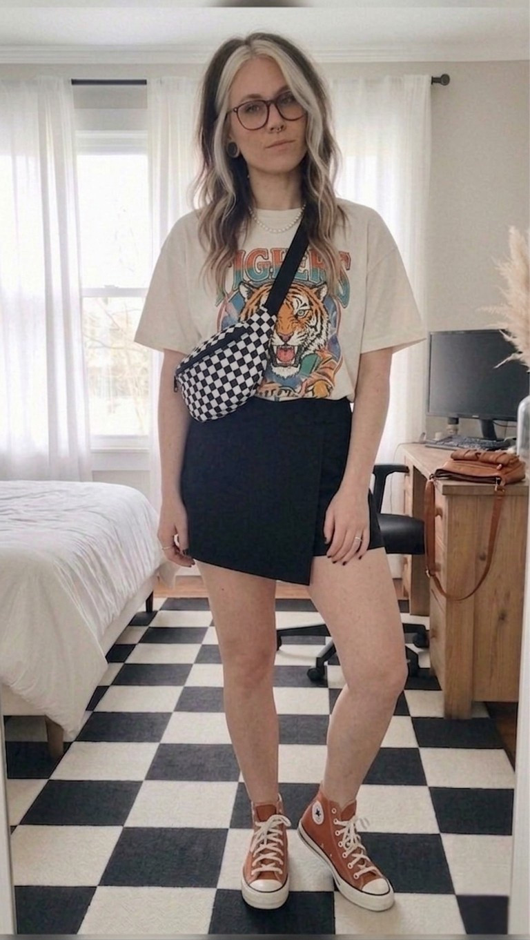 Channeling those effortless alt-cool vibes today! I am obsessed with this oversized tiger graphic tee paired with a sleek black wrap skort—it’s the perfect mix of comfort and style. The checkered crossbody bag and matching rug are definitely having a moment! 🏁

I’ve linked my favorite high-top sneakers (this rust color is everything) and some similar graphic tees to help you recreate this look. Perfect for a coffee run or a casual weekend hang.

#LTKMidsize #LTKootd #LTKSeasonal