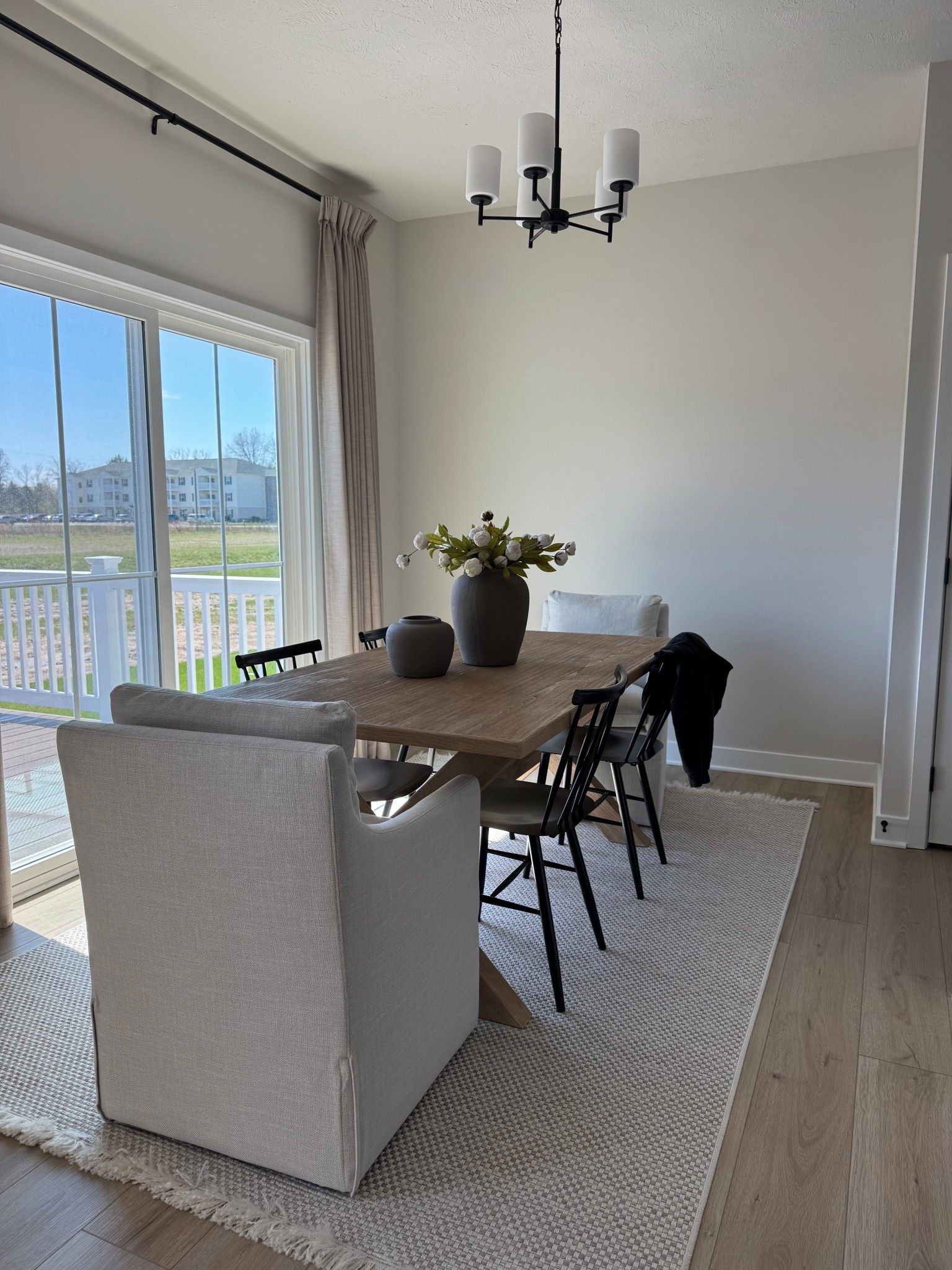 Upholstered chairs, cream rug, black metal chairs, wood dining room table, rectangular dining room table, dining room styling

#LTKSeasonal #LTKOver40 #LTKHome