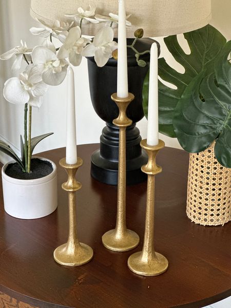 This set of brass finished candlesticks was such a find!  If you’re looking for taper candle holders, these are so pretty and have a nice weight to them!  It’s hard to tell them apart from a more expensive set.  Both candlestick sets are linked below so you can save or splurge!

#LTKhome #LTKstyletip #LTKSeasonal