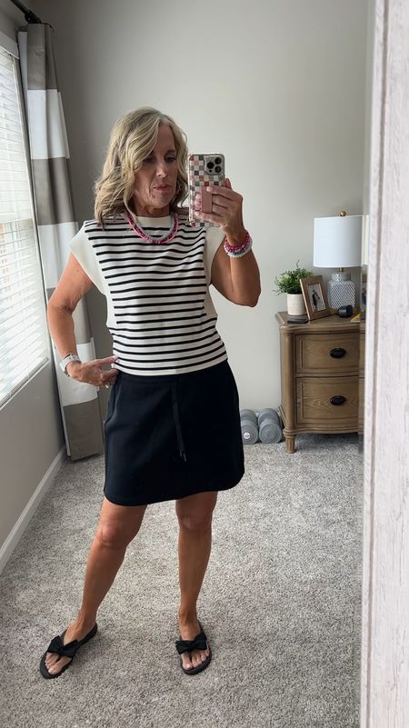AirEssentials mini skirt and tee with cap
Sleeve. Wearing small top, medium skirt (could have worn small) 
Use LISAXSPANX 
USE COAST20 on Allie + Bess

#LTKtravel #LTKstyletip #LTKover40