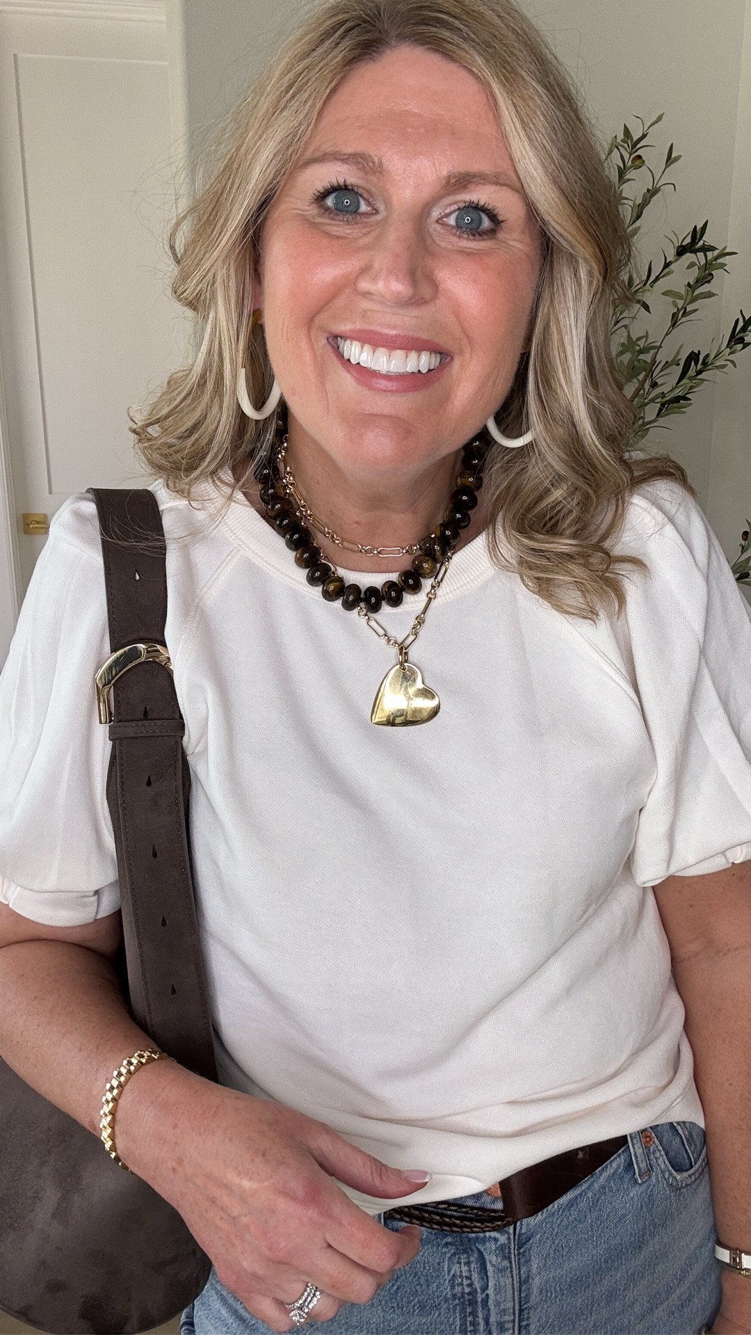 Puffed sleeve sweatshirt is lightweight and has a relaxed fit. Banded around the bottom. Runs true size.
Denim are very stretchy. Rent tree size.

#LTKOver40 #LTKootd #LTKSeasonal