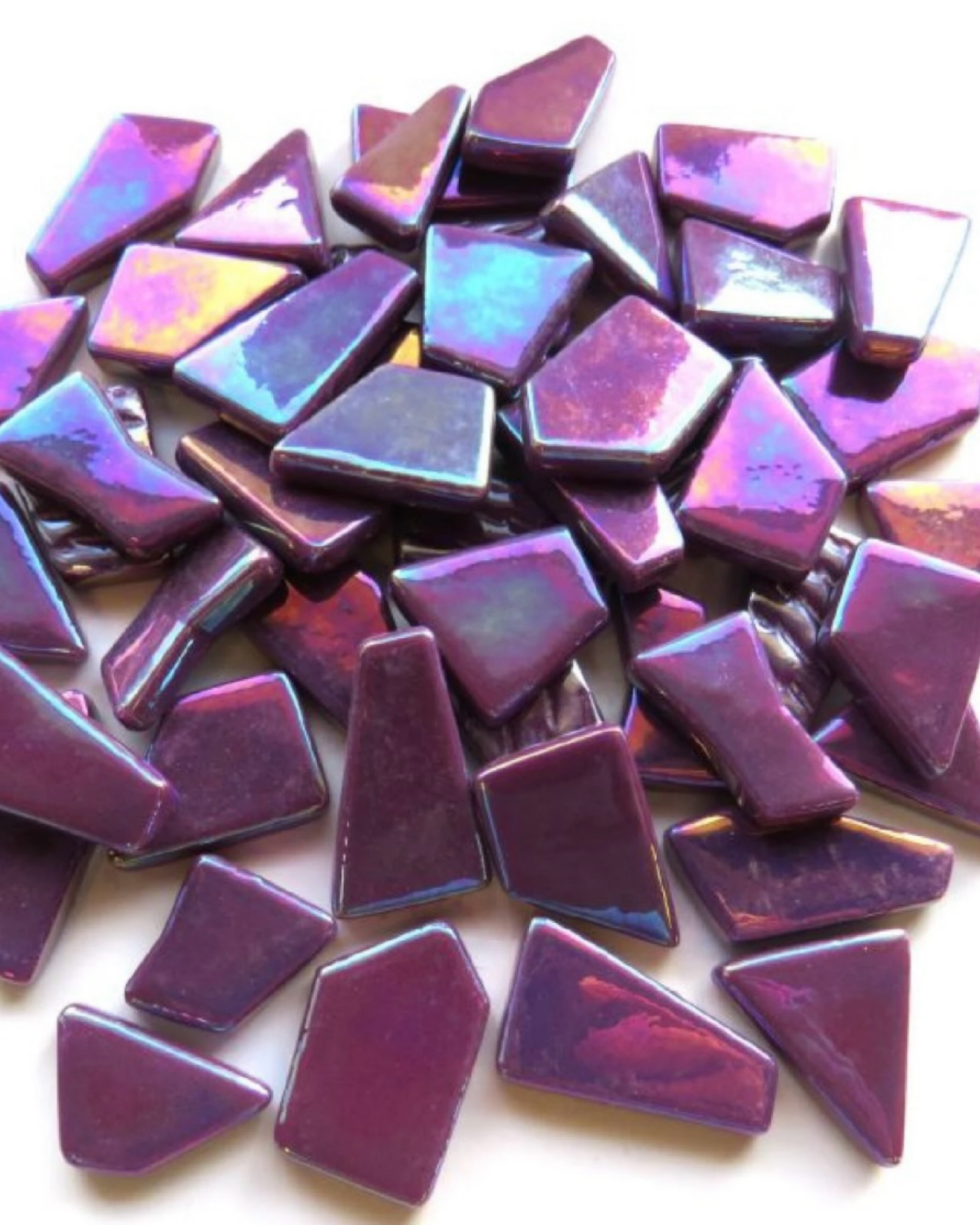 Sharing purple iridescent, irregular-shaped tile to use in mosaic art. 💜 For mosaic tips, tutorials, inspiration, and so much more please visit my YouTube channel: YouTube.com/julieweilbacher. Follow @julieweilbacher on Instagram for all things mosaic art. Purple tile - mosaic - glass tile - iridescent glass tile - mosaic art - crafts supplies - glass mosaic tile - glass art - tile art

#LTKFindsUnder50 #LTKHome