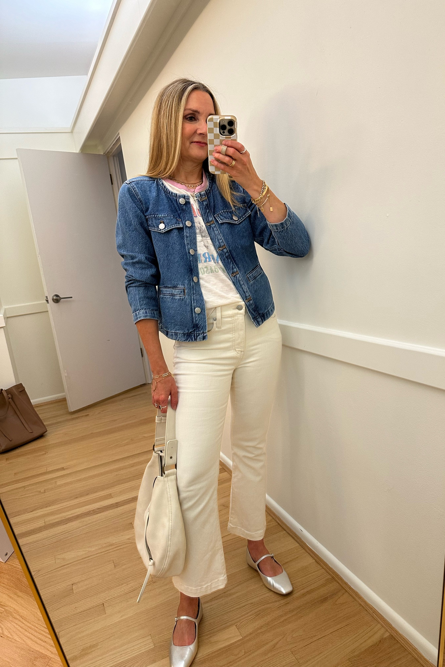 Lunch with a friend outfit inspo! Madewell collarless denim jacket, Anthropologie graphic tee, Madewell kick out crop ecru jeans, silver dolce vita Mary Jane flats. Work outfit, teacher outfit, back to school 

#LTKFindsUnder100 #LTKWorkwear #LTKOver40