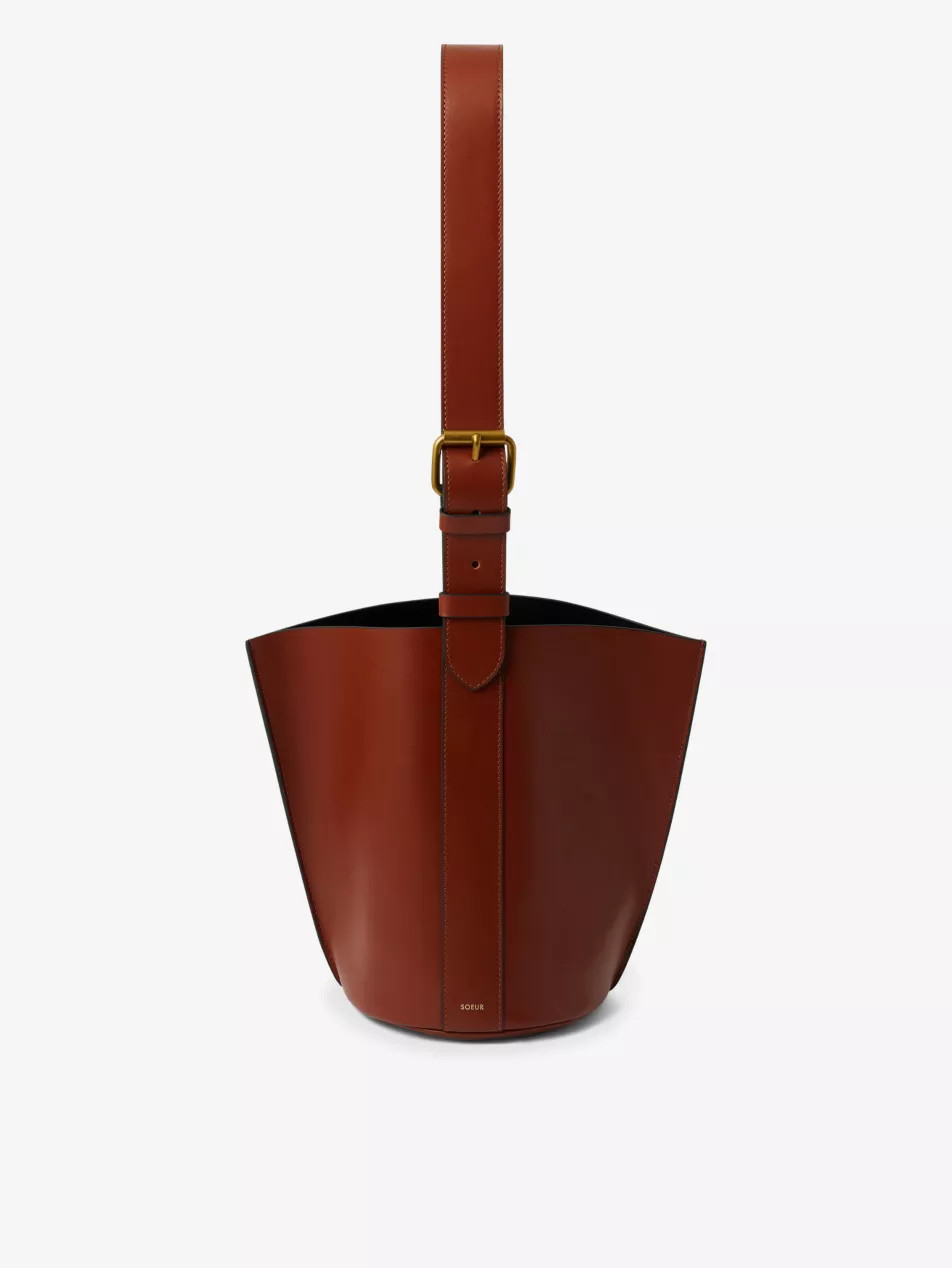 Saudade logo-embossed leather shoulder bag | Selfridges