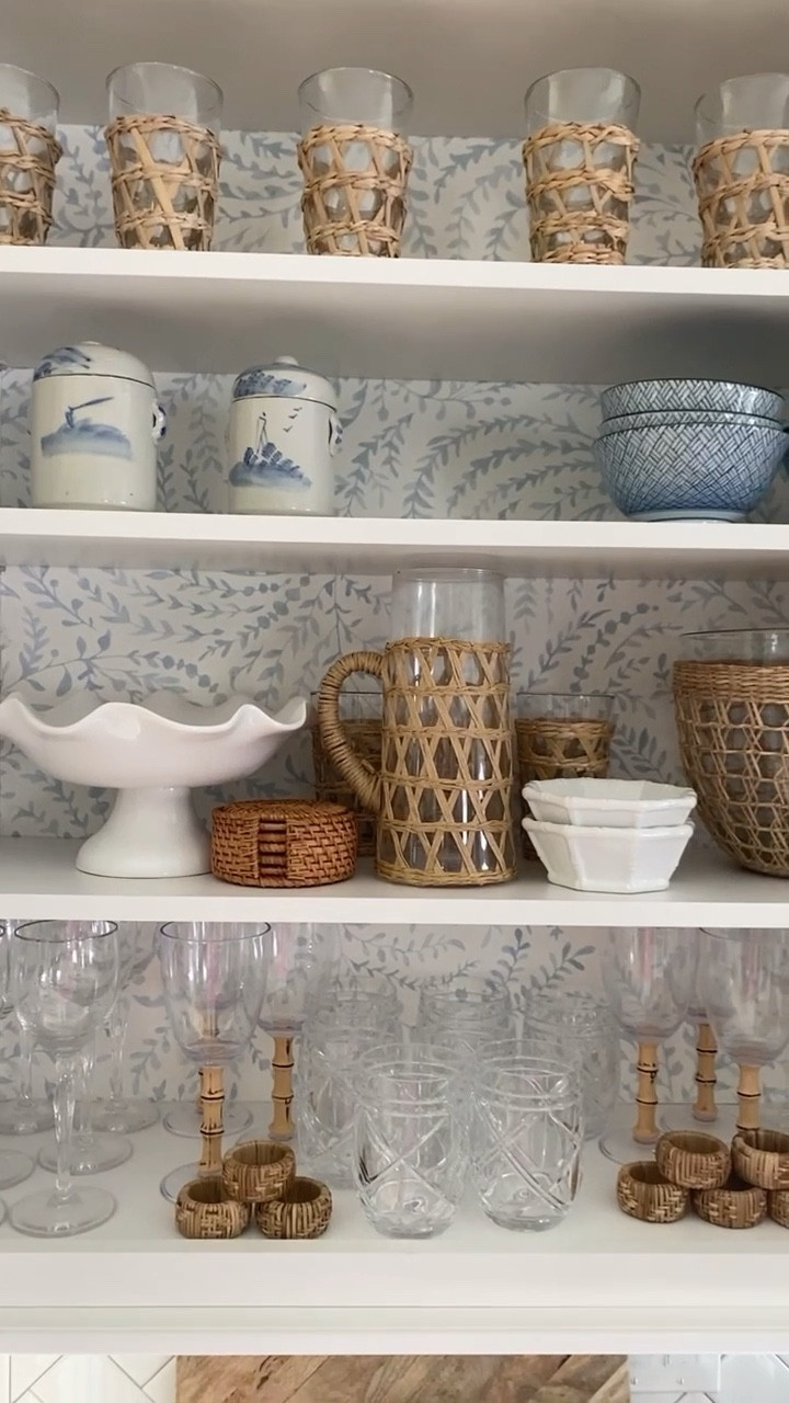 This is one of my favorite spots in my kitchen the Bar / Drink area 💙
My favorite barware 
Rattan 
Bamboo
Melamine 
Serena and lily priano 
Coastal decor 
Grandmillenial 
Coastal grandmother 

#LTKFind #LTKstyletip #LTKhome