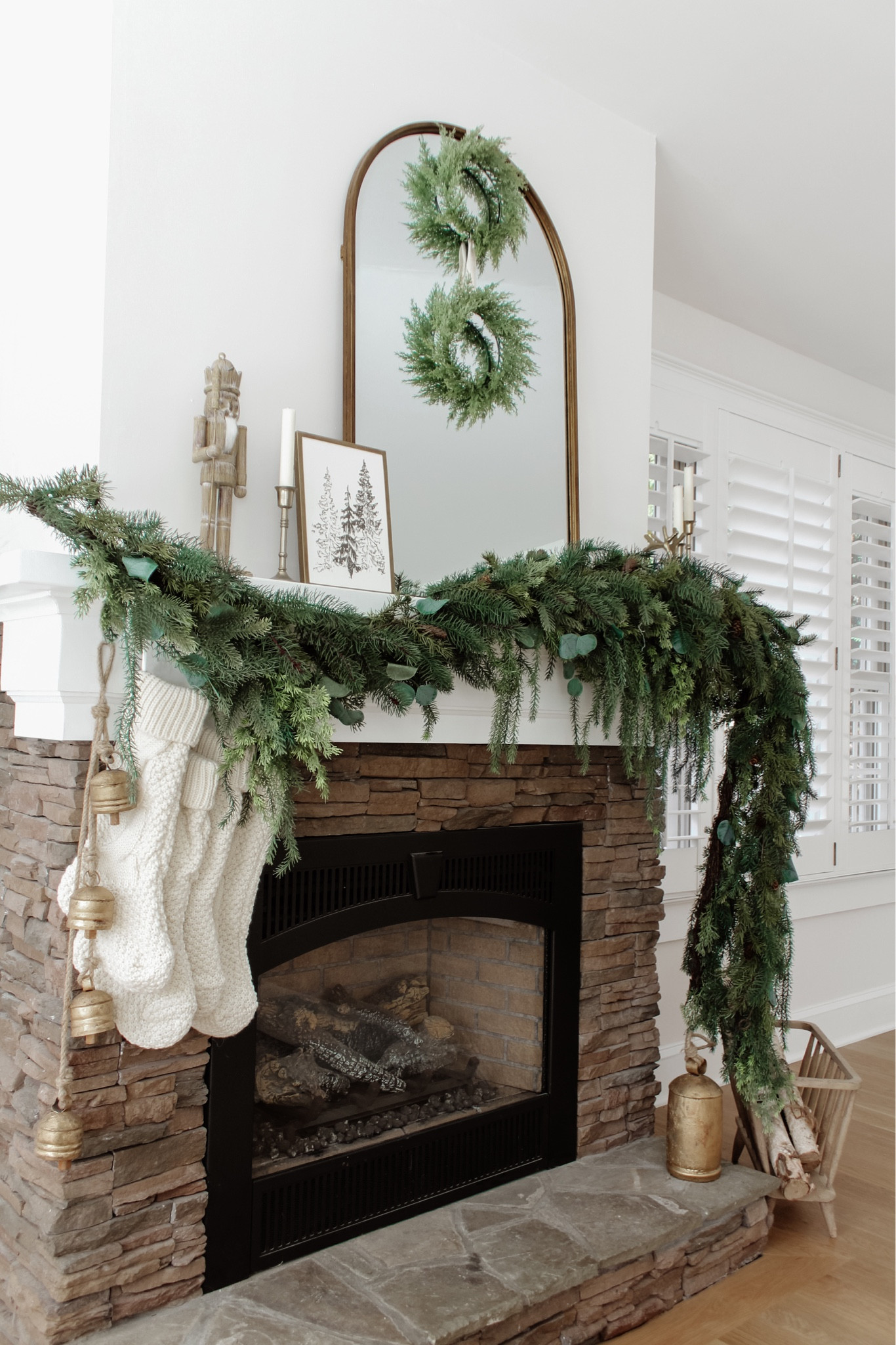 Simply make a big impact with Garland this season ✨ In case you missed it, this week brought:
-A simple harvest tablescape to inspire your thanksgiving table. Grab items that are quick-ship from the post!
-The November Edit: curated items inspiring home & style this month
-At the moment: items I’m loving, like affordable holiday stems and other latest purchases
-Transition from Harvest to Holiday - a list of items to swap + a 15% off code to @krinto_com !
-The latest affordable finds and early access to Black Friday sales all in one place on the blog!
•
Shop each post, read the blog and more all from the link in bio!
•
•
•

Fireplace mantel garland, Christmas garland, affordable holiday home decor, Michael’s garland, stocking decor, holiday home tour, neutral Christmas, simple Christmas decor, brass decor, holiday home inspo, candle holder, mirror, brass decor, nutcracker, hanging bells 

#LTKHoliday #LTKhome #LTKSeasonal