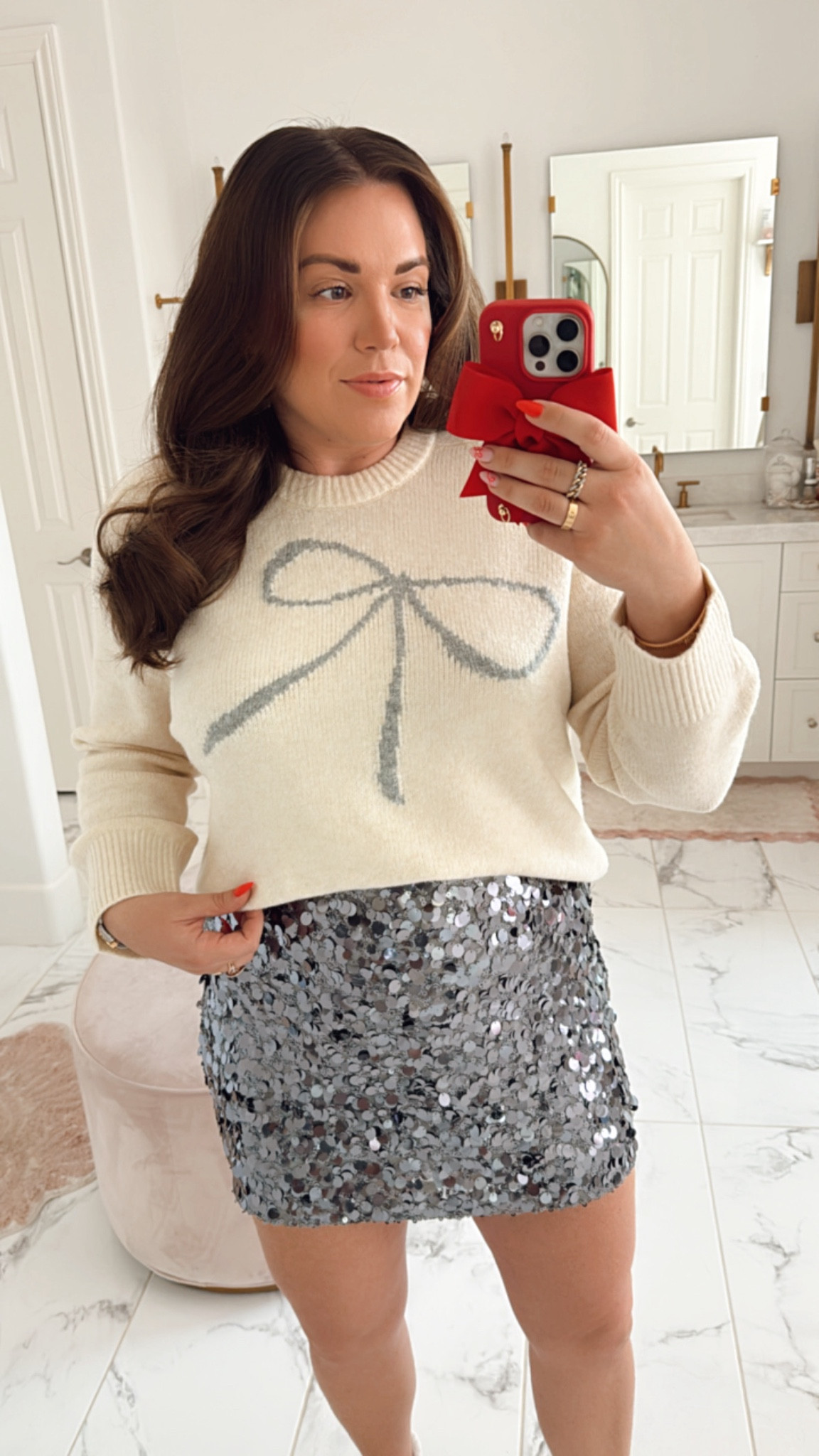 curvy Holiday look! wearing size large in festive bow sweater and size large in silver sequin skort 

#LTKHoliday #LTKFindsUnder100 #LTKMidsize