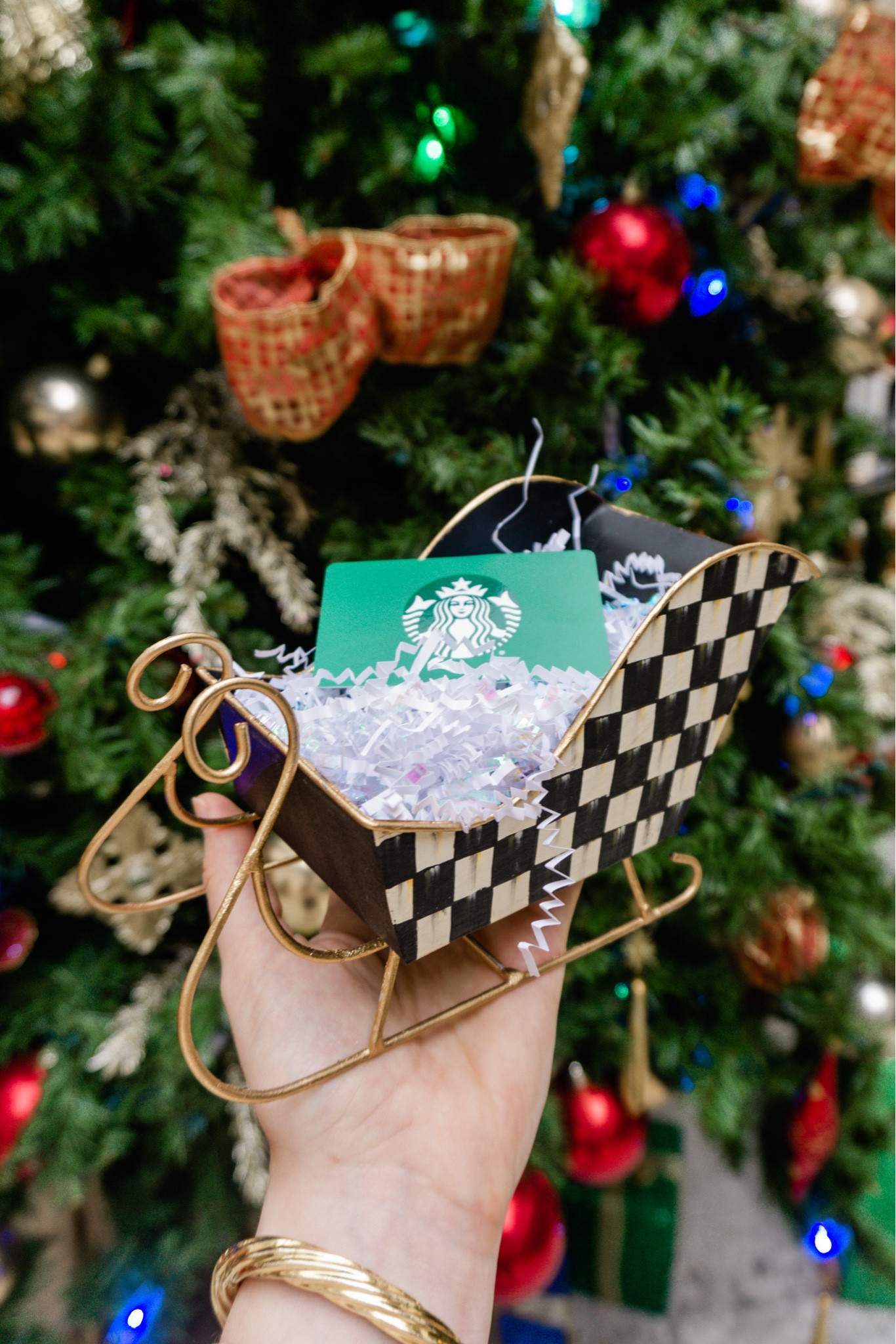 Katey McFarlan Shared This Genius Idea The Other Day And I Just Had To Try It! Instead Of A Gift Card Holder/Gift Bag, Try Adding A Gift Card Or Christmas Treats To A Mackenzie Childs Sleigh! 

#LTKHoliday #LTKhome #LTKSeasonal