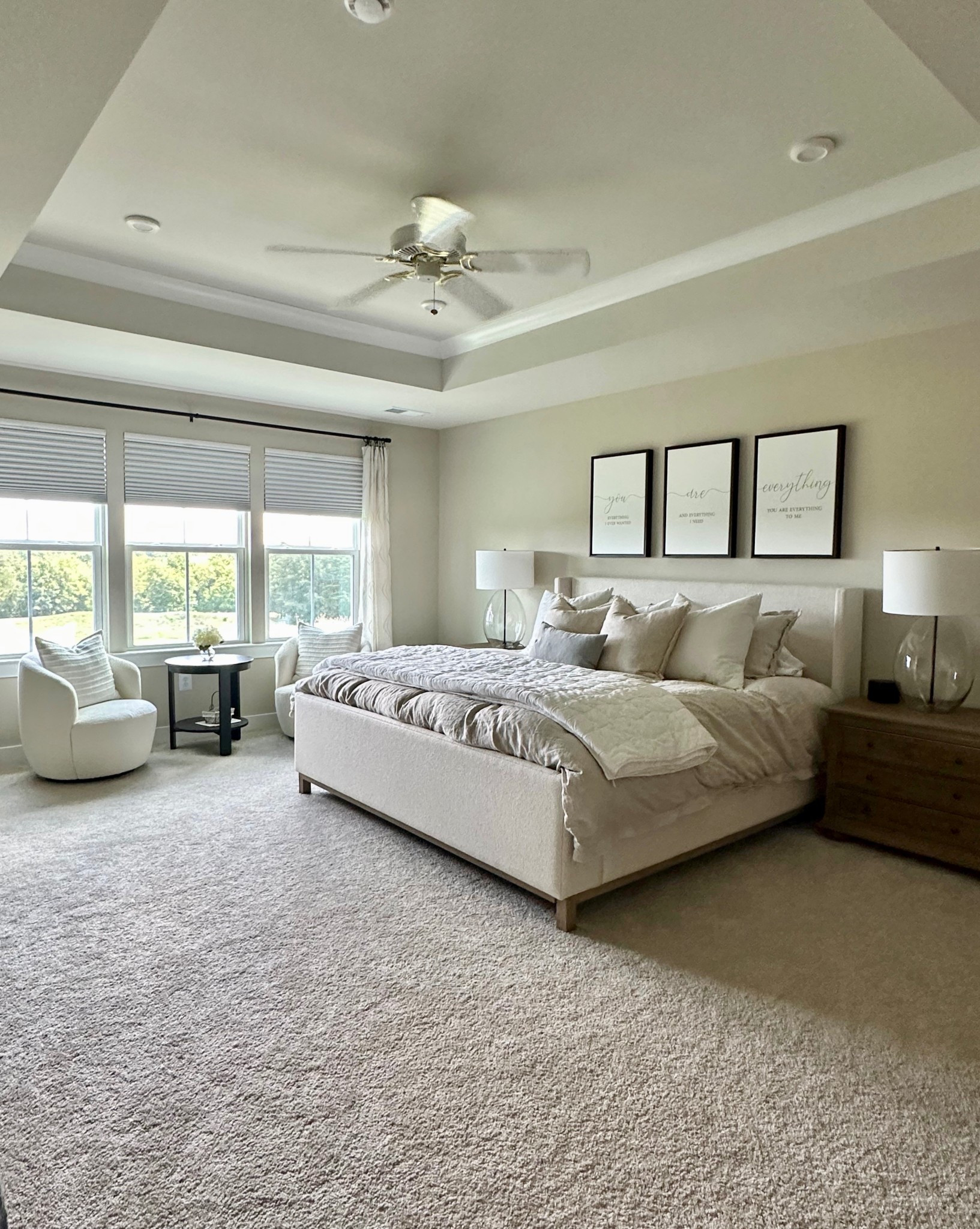 A cozy, cloud-like bedroom retreat 🤍✨

This space was designed to feel light, calming, and elevated—perfect for slow mornings or peaceful evenings. I layered neutrals, added subtle contrast with warm wood tones, and chose soft textures that make this king bed feel like a dream. The clean-lined swivel chairs create the perfect morning coffee corner, and those glass lamps? Always a win for timeless elegance.

Tap to shop the full look—from bedding to nightstands and beyond. Trust me, every detail was worth it. 🛏️☁️

Looking for some assistance in designing your dream space? Call Gracie Lain Design today for your Complimentary Consultation! 

#bedroomdecor #neutralbedroom #ltkhome #cozybedroom #interiordesign #bedroominspo #lightandairy #moderntraditional #shopthelook #gracielaindesign #masterbedroom #modernfarmhouse #potterybarn #linens #masterbedroomlinens #wayfairfinds

#LTKStyleTip #LTKSaleAlert #LTKHome