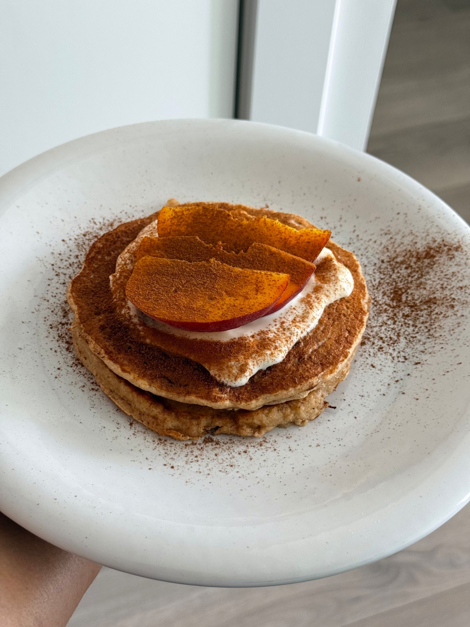 peaches and cream protein pancakes ✨ i’m loving this summer breakfast idea!  

i just mixed casein protein powder into pancake mix! the cream is greek yogurt, agave, and vanilla bean paste. 

#LTKHome #LTKFamily #LTKActive