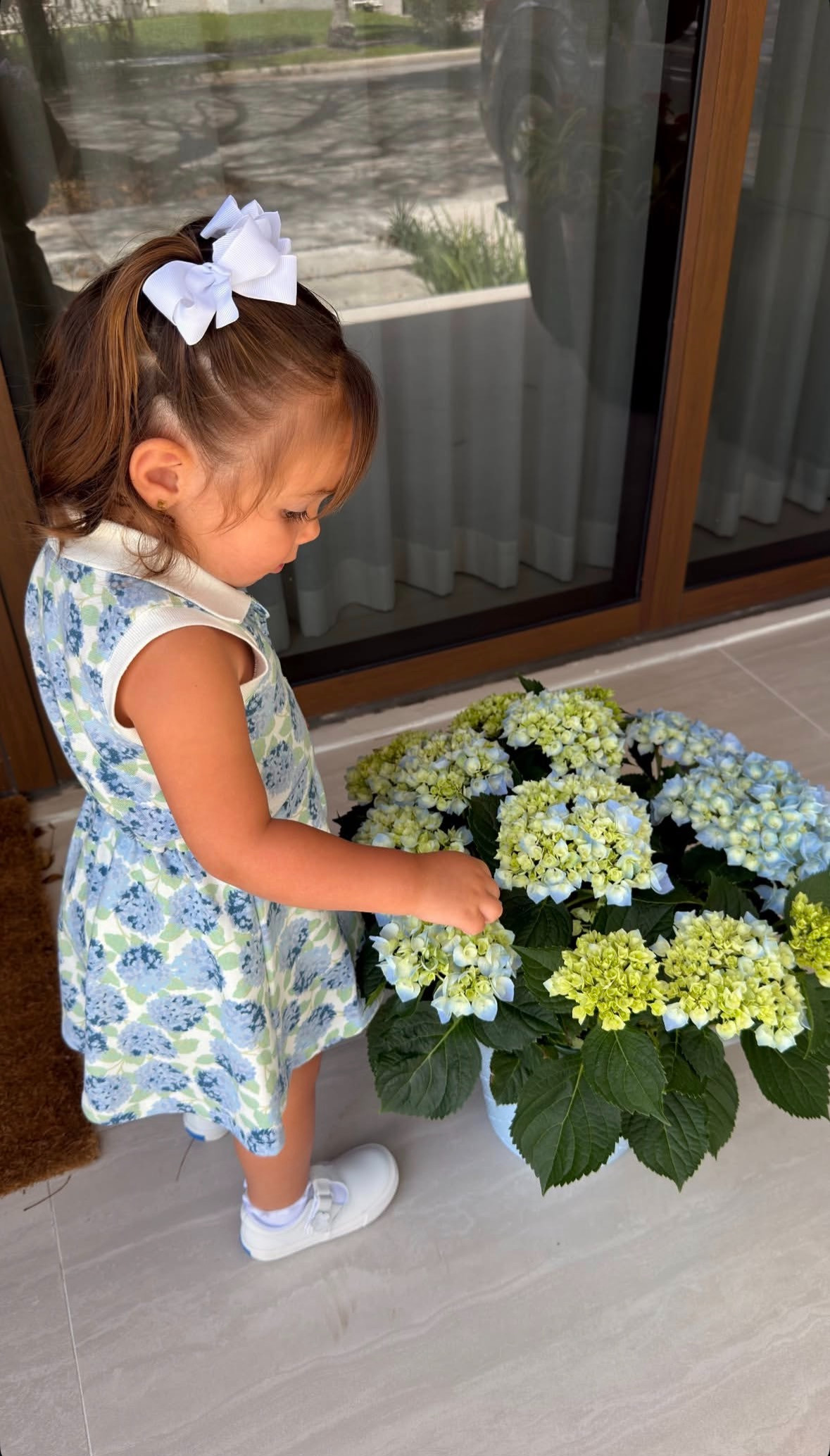 Found my matches! 💙🌸 The flowers are cute, but the outfit coordination is standard protocol 

 #LTKootd #LTKmomlife #LTKKids