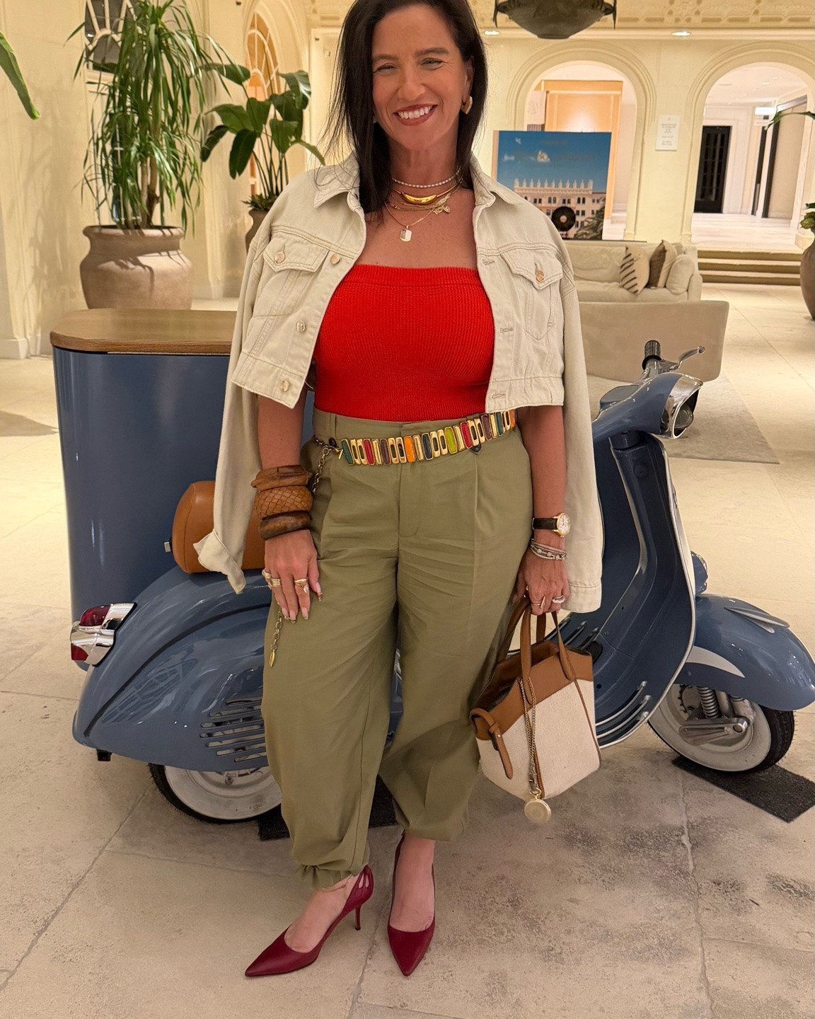 Girls’ night out… but make it versatile.

This look can go in three completely different directions:

❤️ Keep the heels for an elevated dinner look.
🩴 Swap them for simple flip-flops or flat sandals, and you’re ready for a casual lunch or vacation stroll.
🤍 Lose the cropped jacket, and suddenly the outfit feels a little bolder for date night or cocktails.

I’m wearing:
• Red knit tube top
• Olive jogger pants
• Cropped ivory denim jacket
• Red vintage pointed-toe pumps
• Statement belt
• Layered gold jewelry + stacked wood bangles
• Neutral structured handbag

I linked similar pieces so you can recreate this look with your own style and budget.

#midlifestyle #over50style #womenover50 #styleover50 #everydaystyle #capsulewardrobe #outfitideas #vacationstyle #girlsnightout #wearwhatyoulove #fashionover40 #ltkcreator

#LTKootd #LTKOver40 #LTKTravel