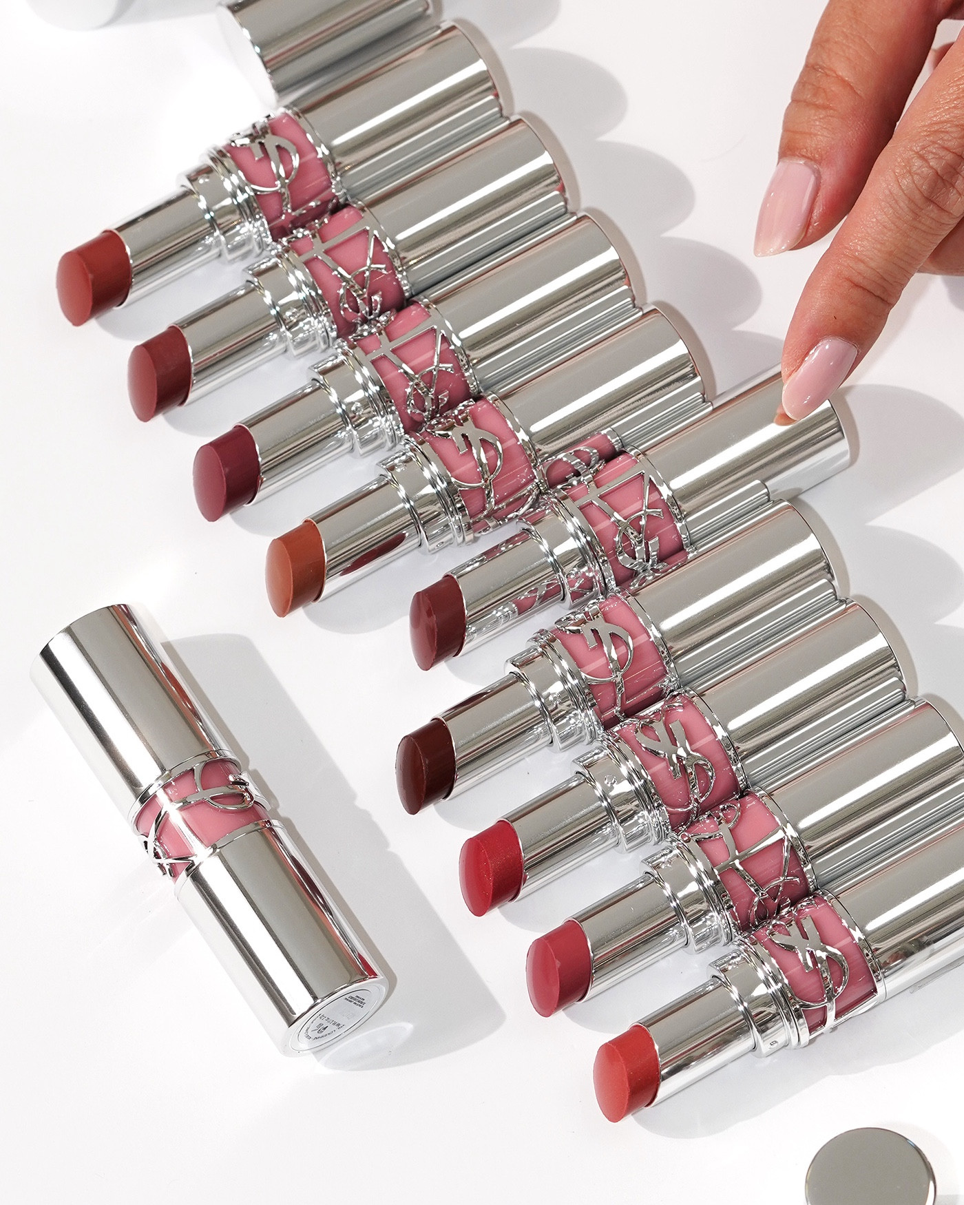 Swipe for swatches of the new YSL Loveshine lipsticks

201 Rosewood Blush is a sheer rose pink (looks warmer in tube, but cool on my lips)
202 Peachy Glow is a taupe rose nude (also pulls cool on my lips)
203 Blushed Mallow is a cool mauve
204 Melted Honey is a sheer pale beige
205 Nude Self is a berry rose
207 Scenic Brown is a berry brownish shade
209 Pink Desire is a pretty warm brighter pink 
44 Nude Lavalliere is a cool-toned pale pink
150 Nude Lingerie is a warm peachy pink

#LTKxSephora #LTKbeauty #LTKsalealert